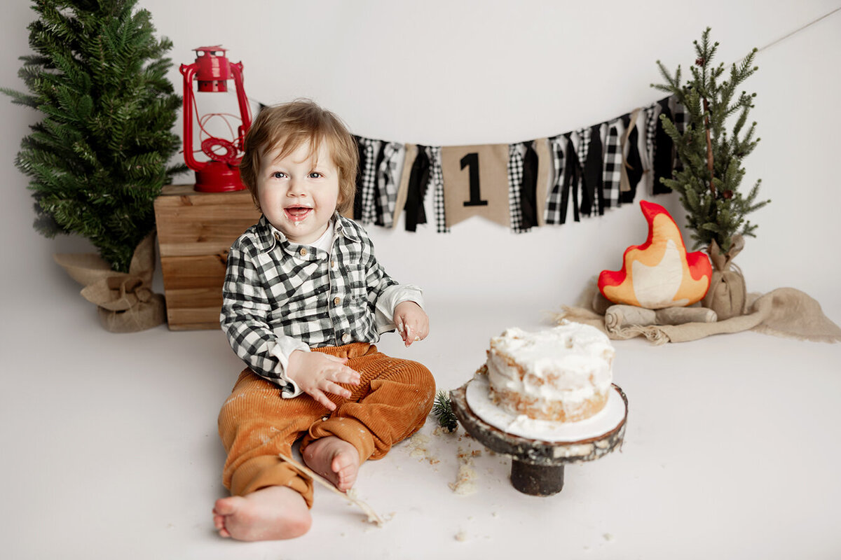 First year photo shoot with a camping theme