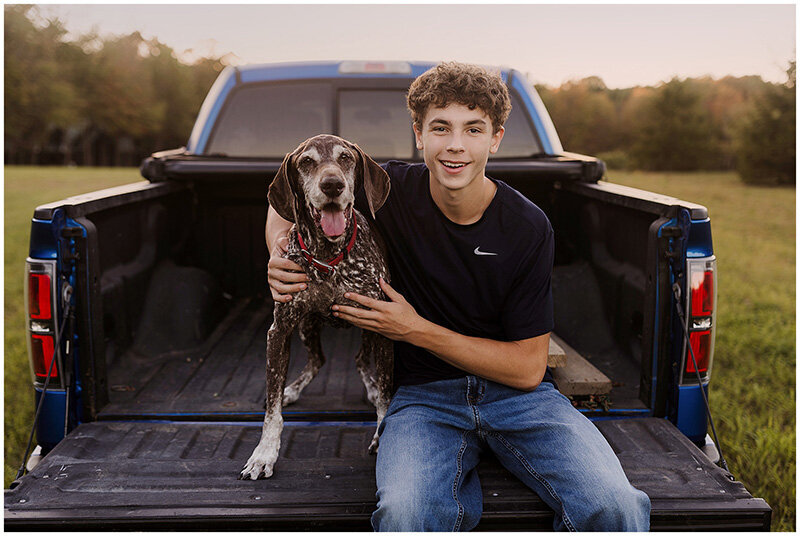 High School senior with his dog and truck