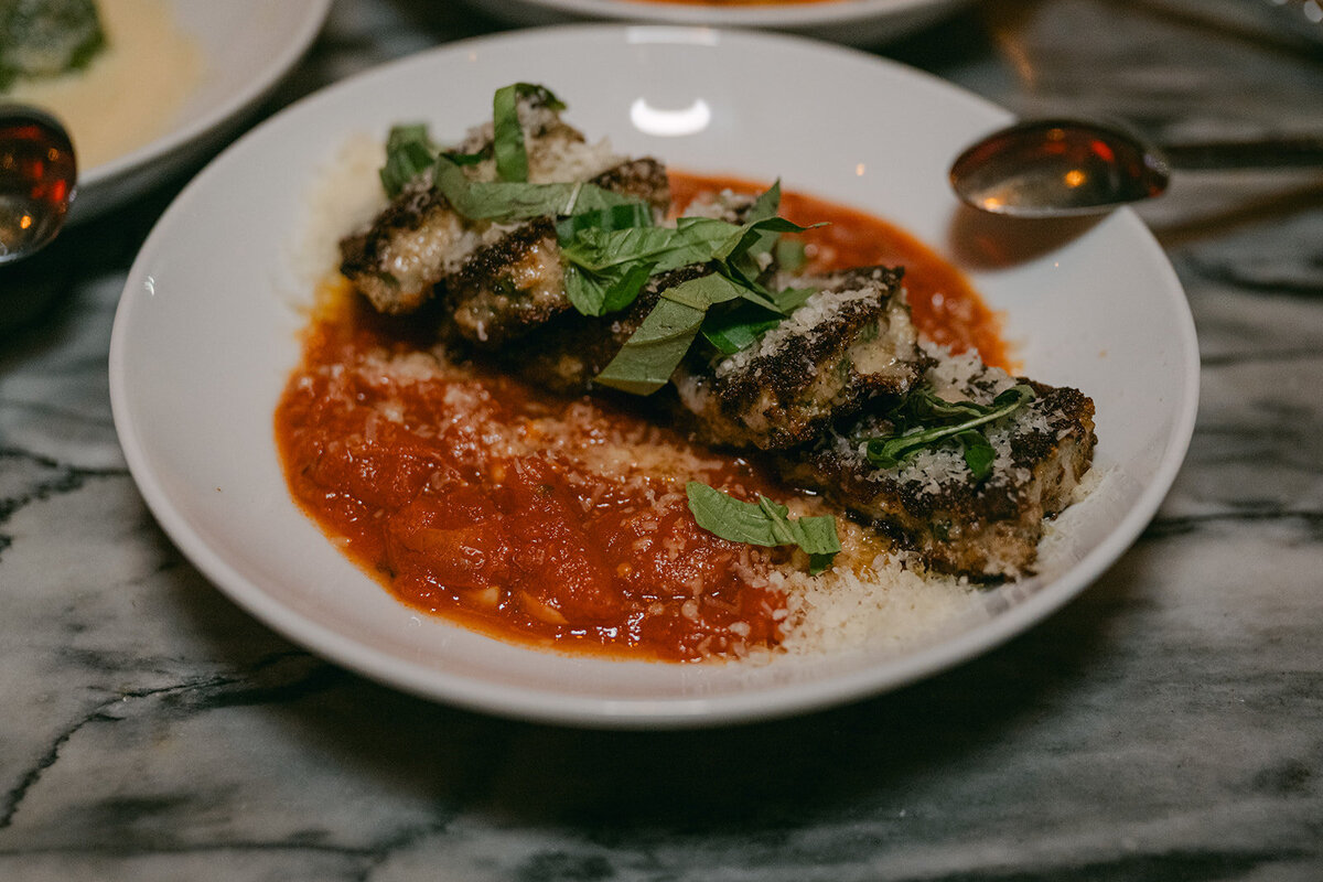 Editorial capture of gourmet plated entrée served at The Battalion in downtown San Antonio wedding