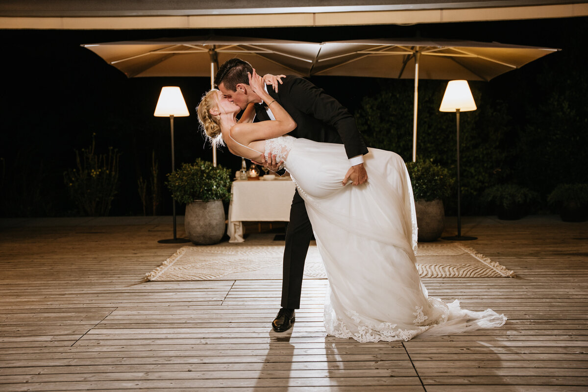 Bride and groom smiling during first dance