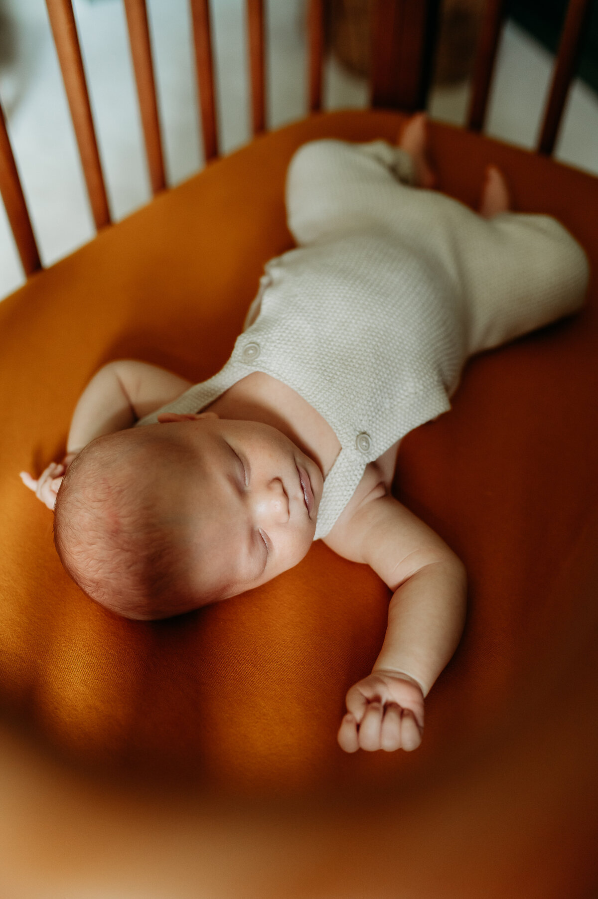 A luxury newborn photography session in Timonium, capturing delicate details and peaceful moments in soft, natural light.