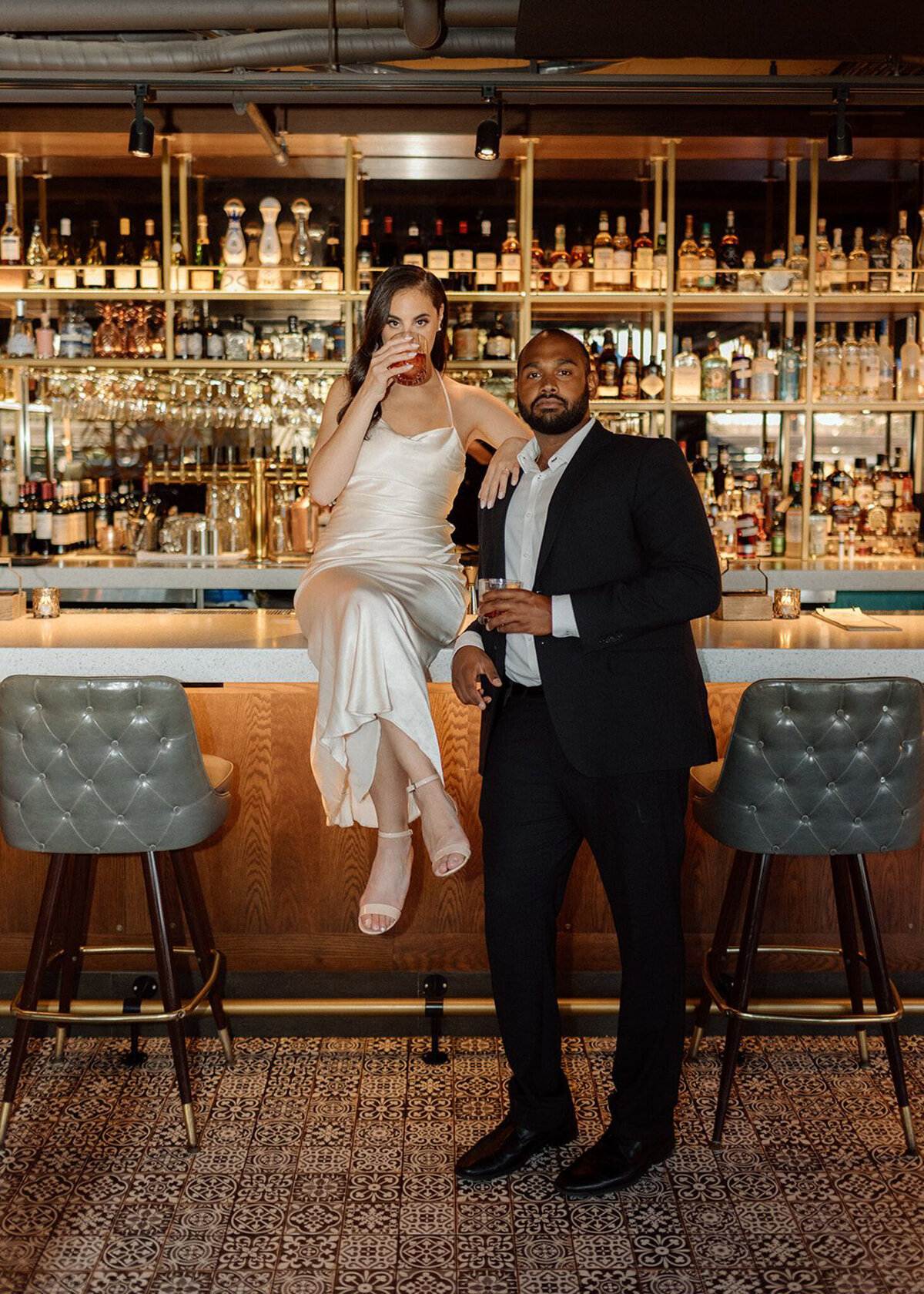 Trendy and modern wedding portrait of a couple at a bar inspiration by Bronte Taylor Photography, is a Vancouver-based photographer with a playful, genuine and intimate approach.