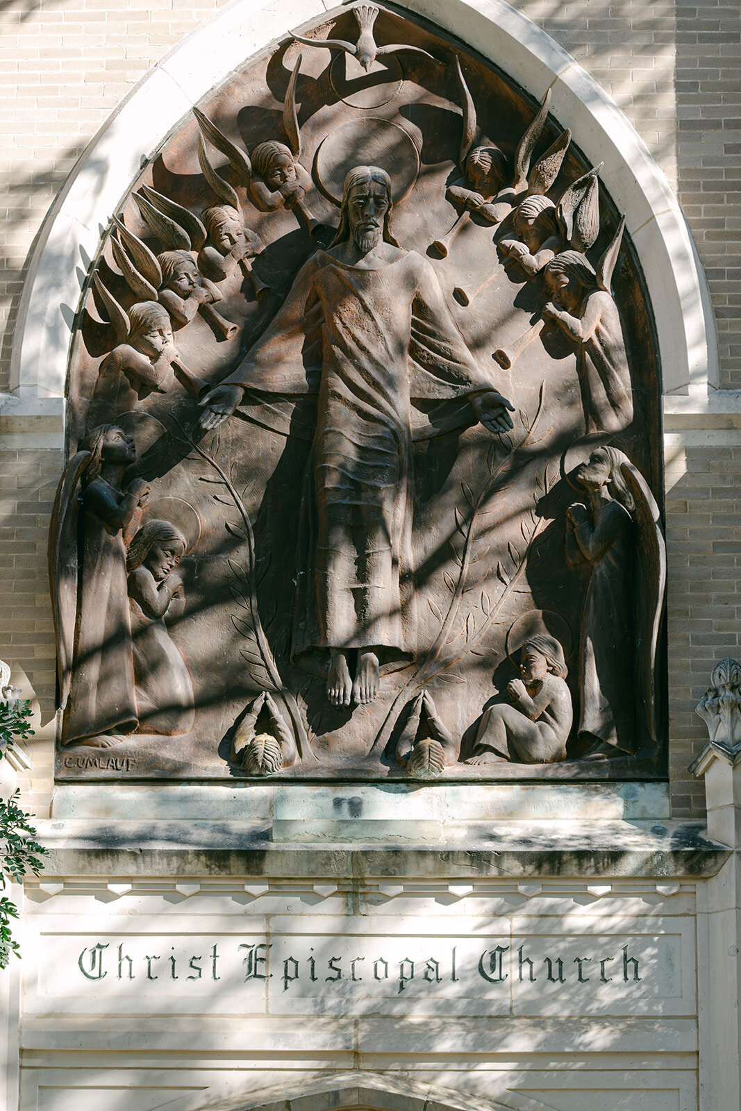 Editorial image of statues outside of an elegant church wedding before wedding begins