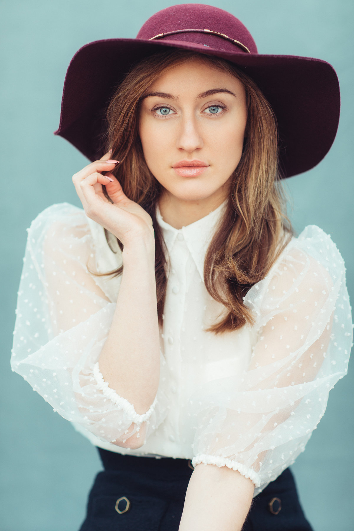 Portrait Photo Of Young Woman In White Blouse And Red Hat Los Angeles