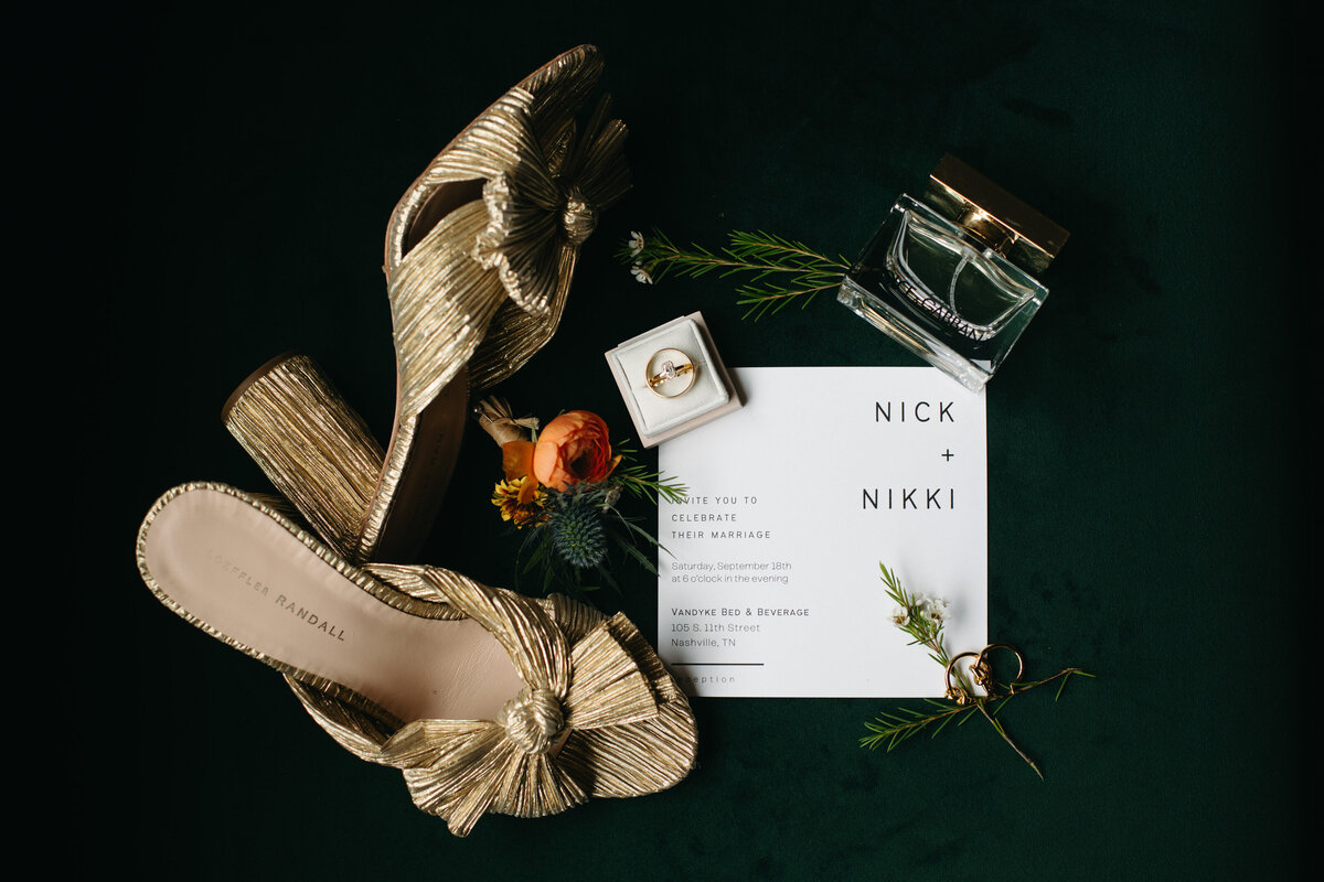 wedding day shoes, invitation, flowers and perfume