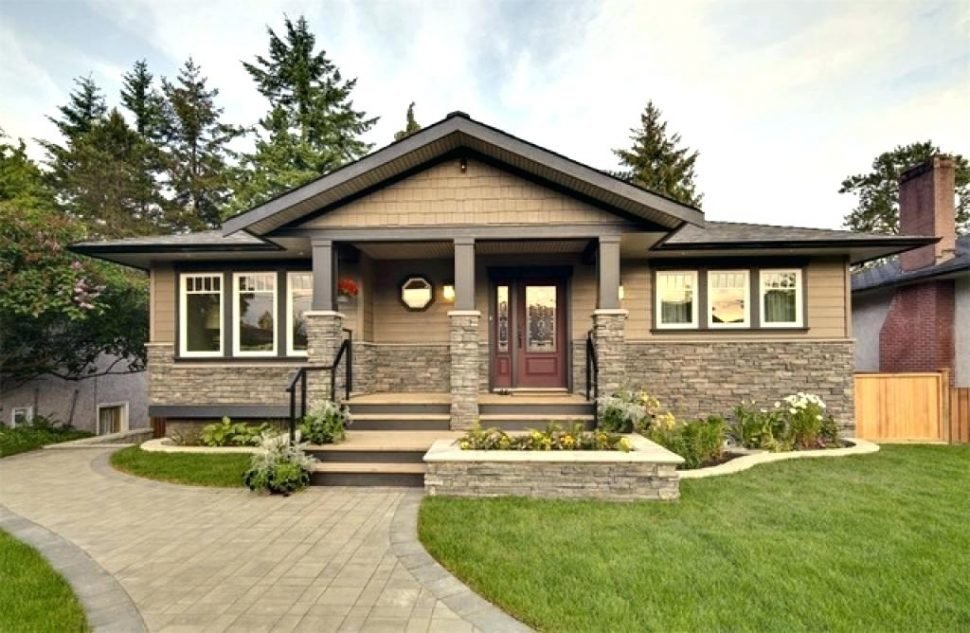 a nice shingled and stone front home with ample light.