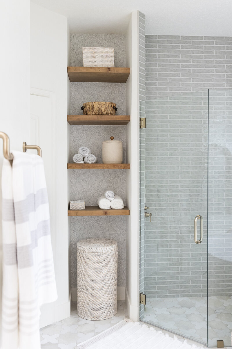 dewine design orlando interior designer belle isle bathroom wooden floating shelves