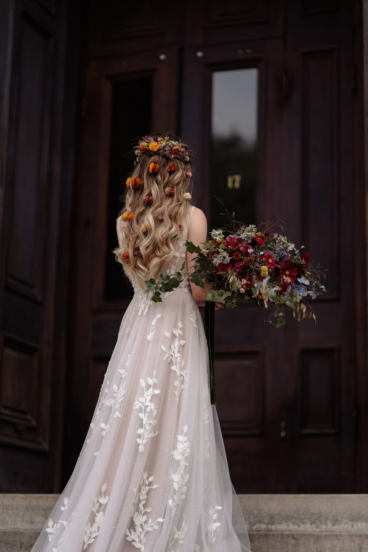 Bridal portrait of her hair and bouquet with soft light and timeless tones