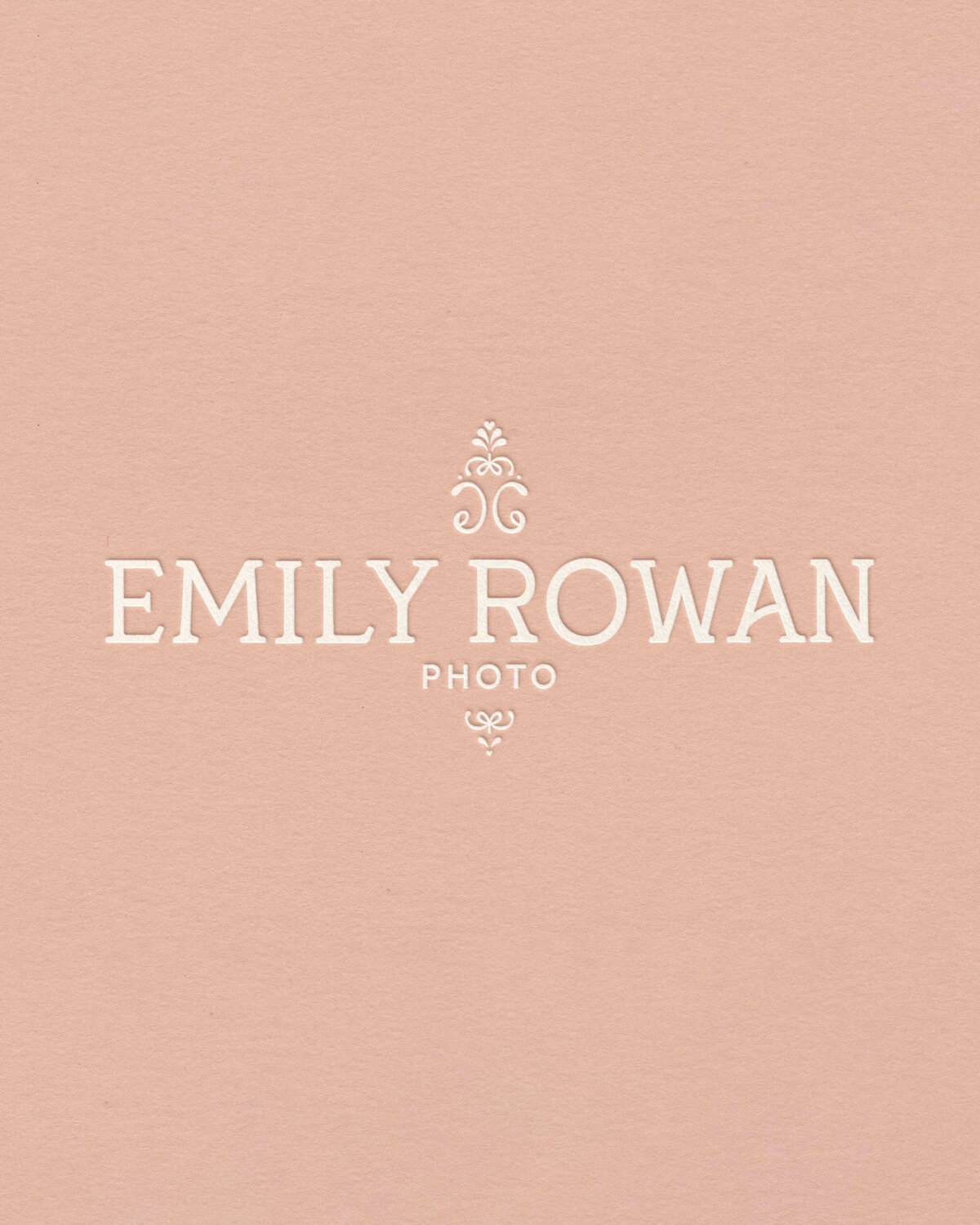 Soft blush logo design with serif typography and romantic filigree, crafted for fine art photographers and creative brands.
