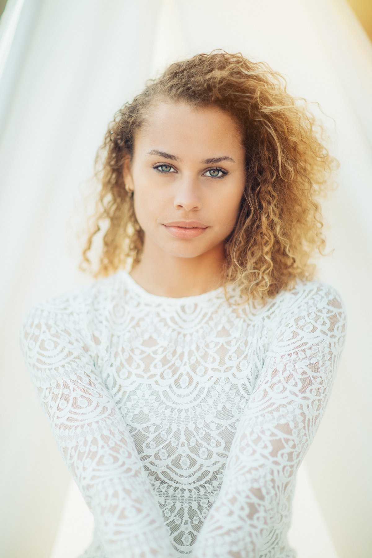 Portrait Photo Of Young Black Woman In White Dress Los Angeles