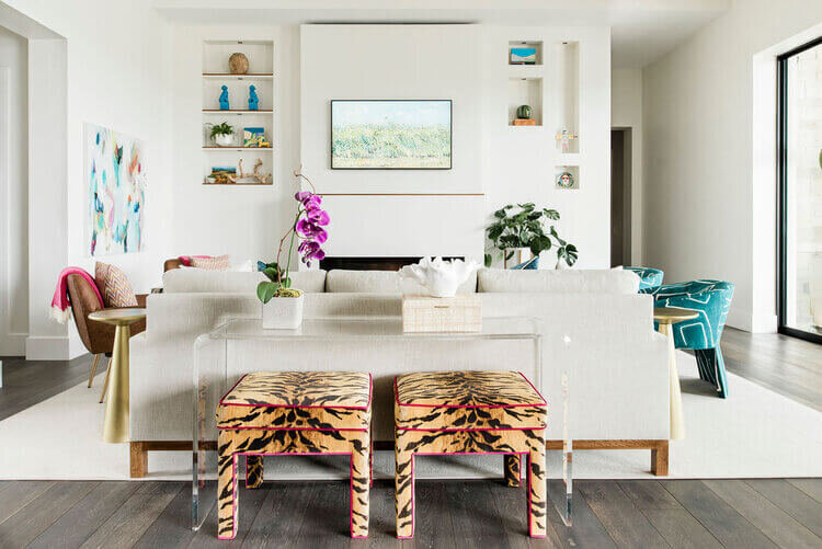 oyster creek studios austin barton creek tiger print and hot pink stools in living room