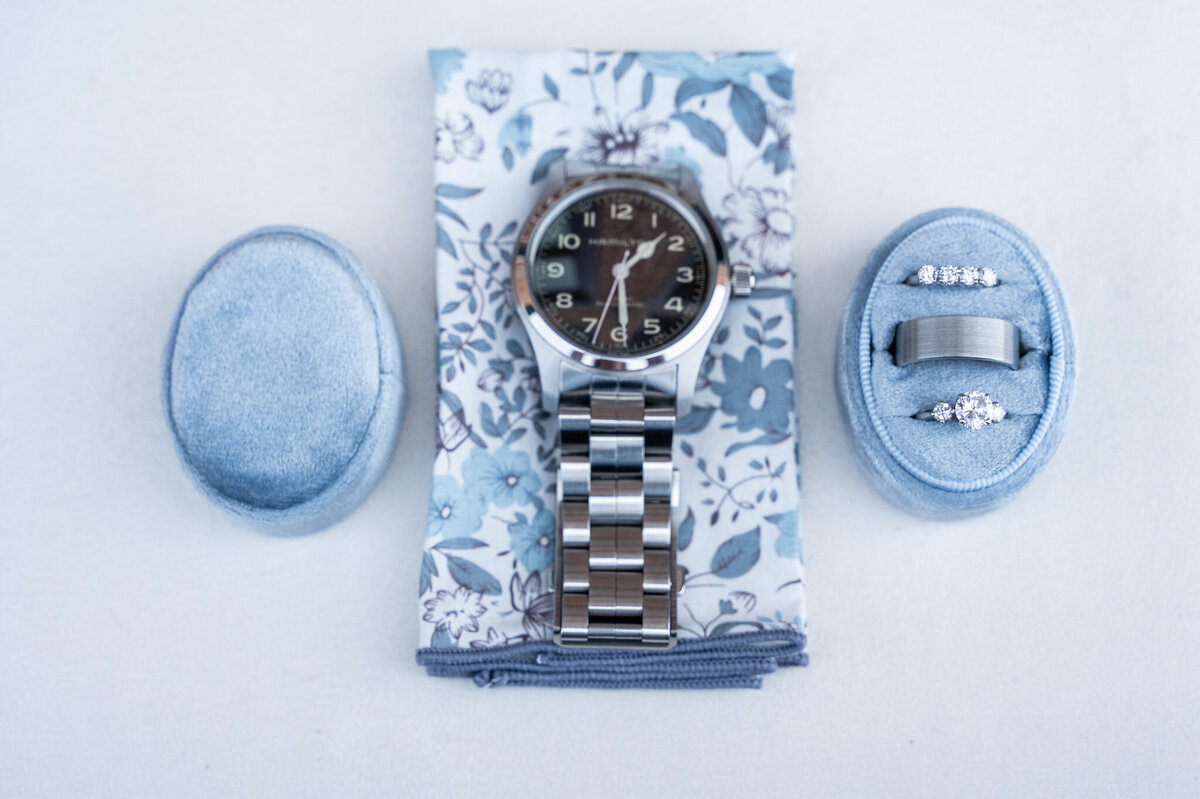 blue wedding decor and watch