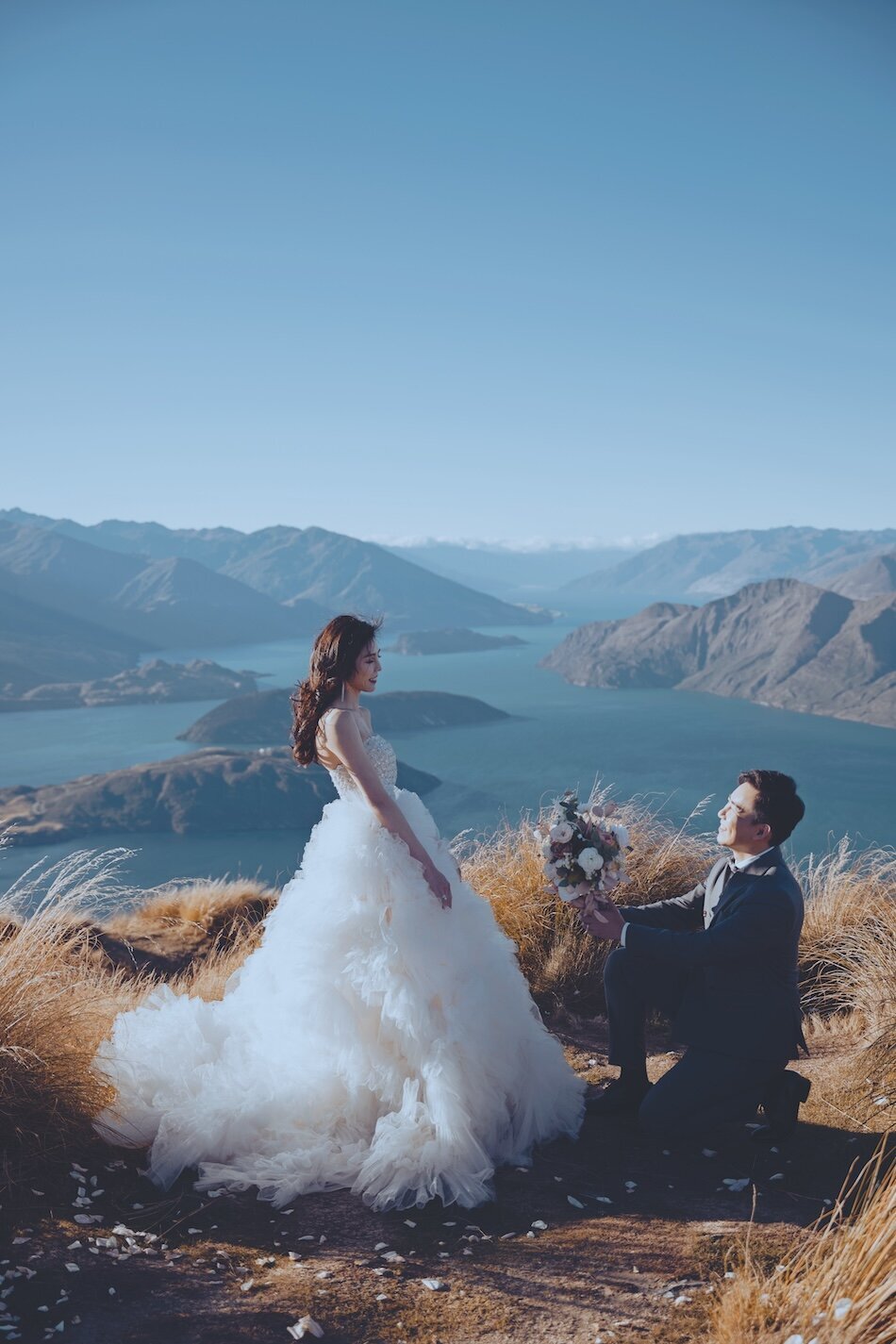 Autumn wedding shoot at Millbrook, Arrowtown. Vintage car & helicopter.