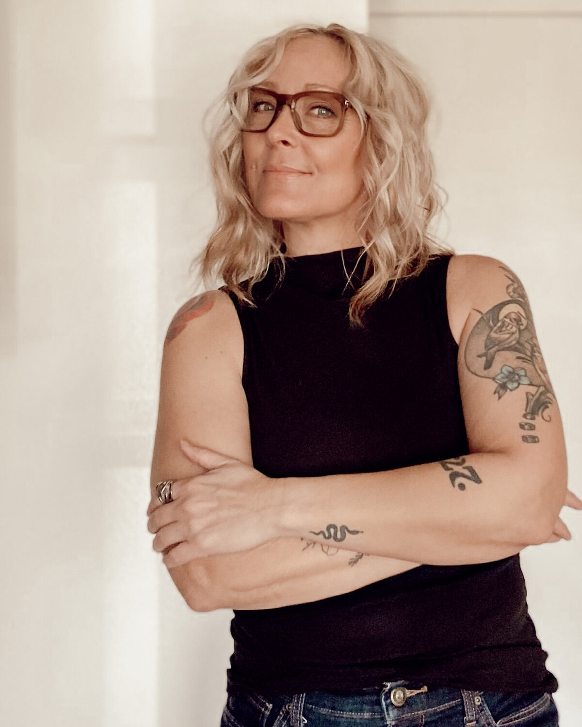 about page image for brandy boyett typing on a laptop