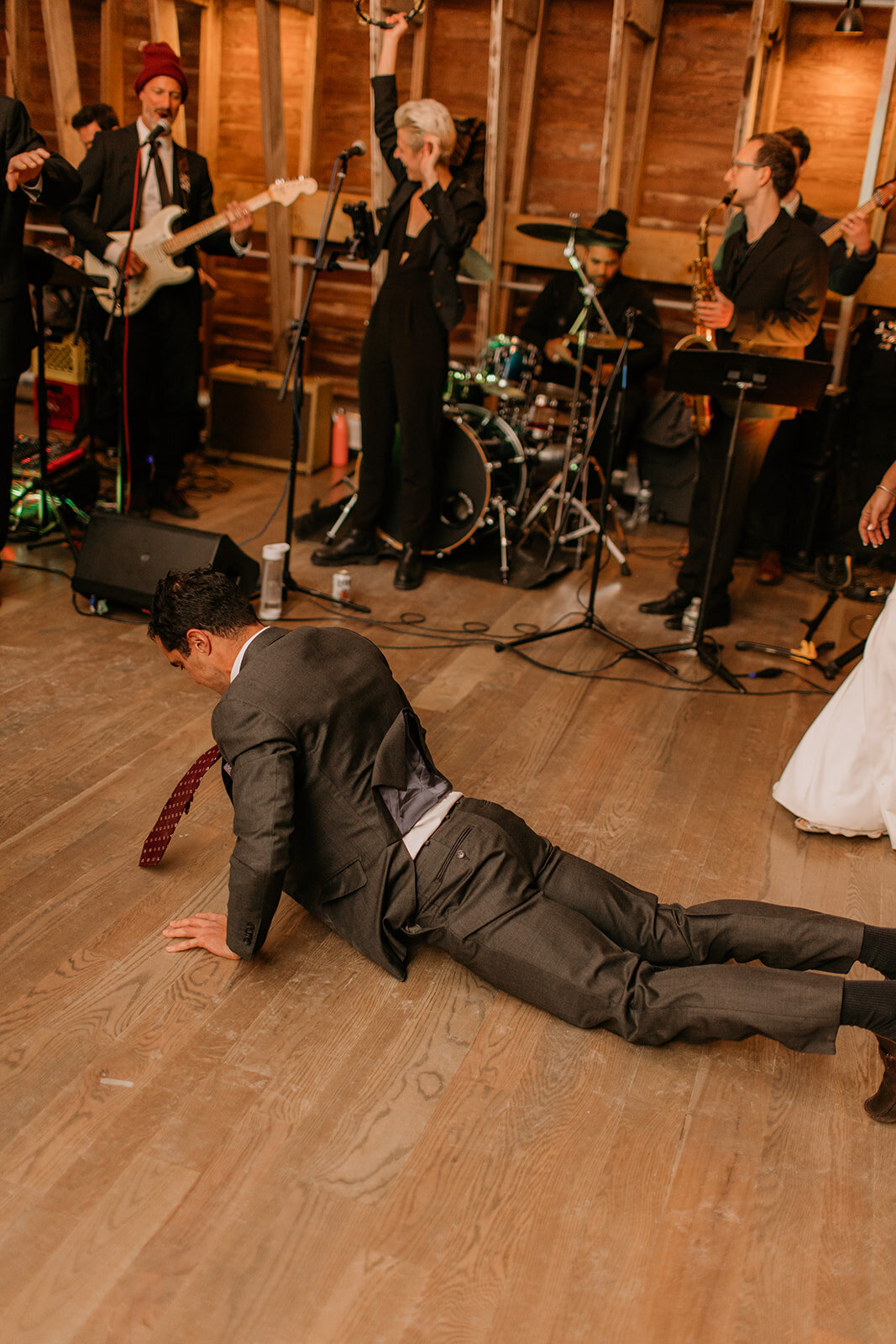 Wild dance floor moment during a wedding at Glenwood Mountain in New Jersey.

