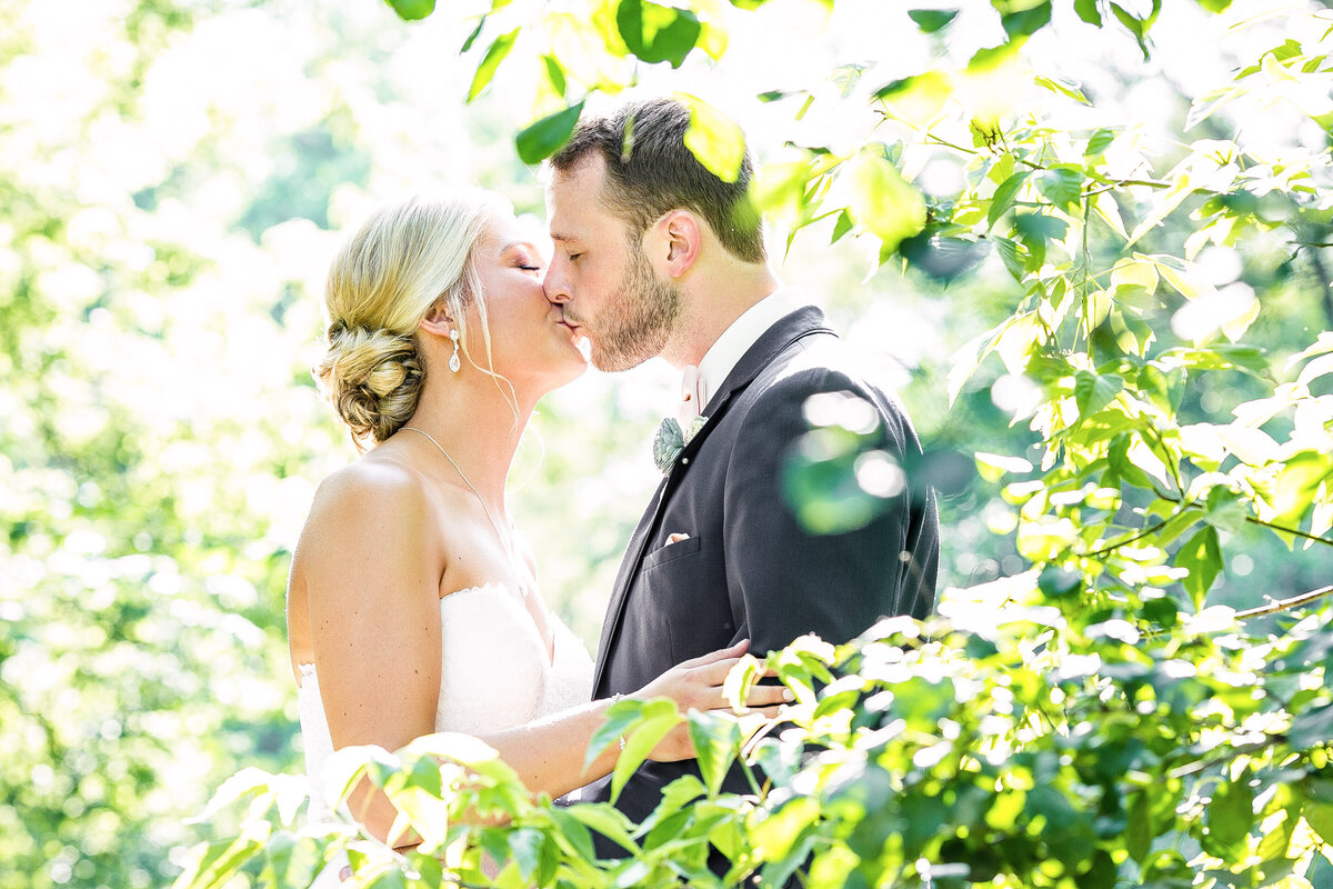 njeri-bishota-lauren-ashley-wedding-stunning-bride-groom-blonde-beard-kiss