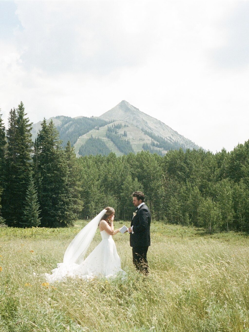 bride and groom sharing private vows in crested butte colorado