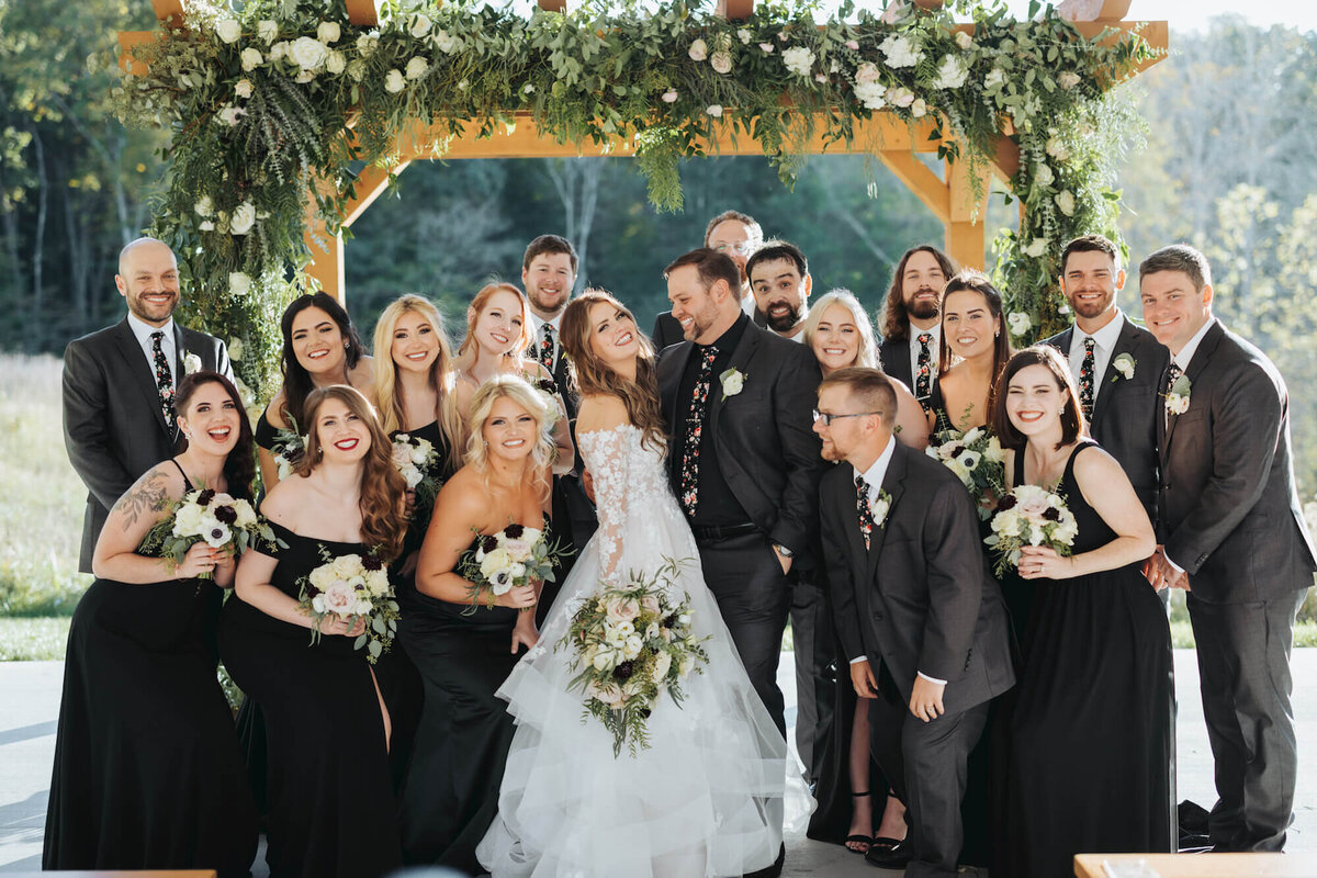 Shannan and Alex Wedding - wedding party with flowers