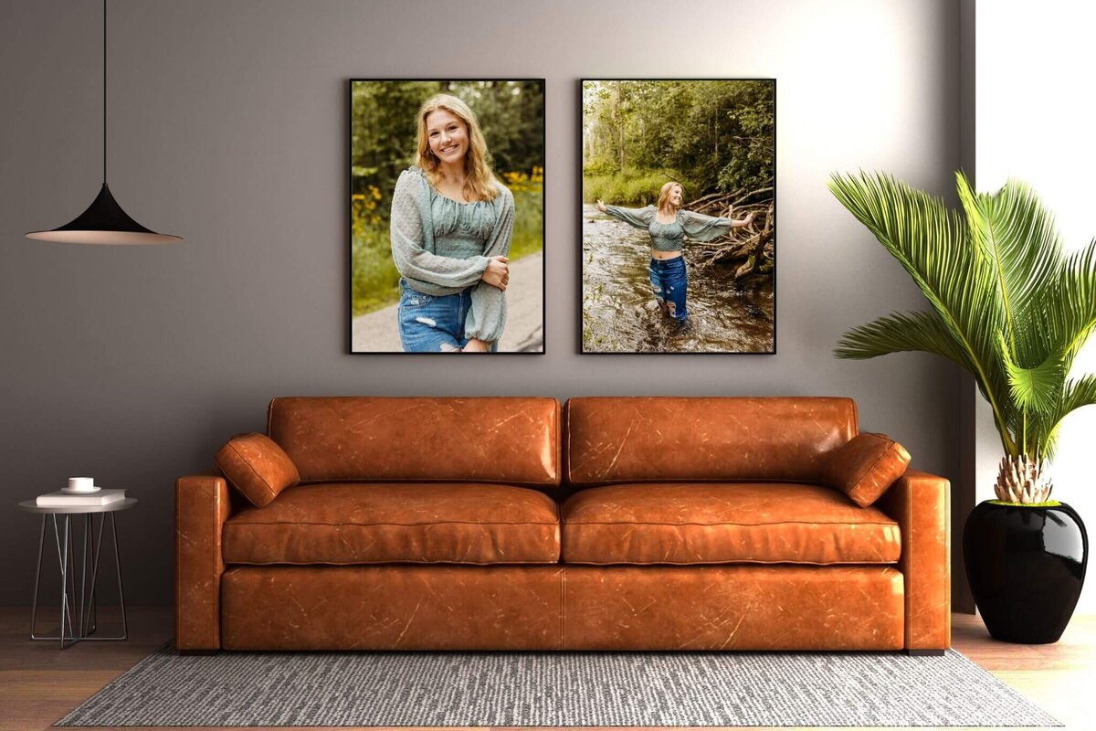 living room with leather sofa and two hanging photos of a senior by Ashley Kalbus Photography