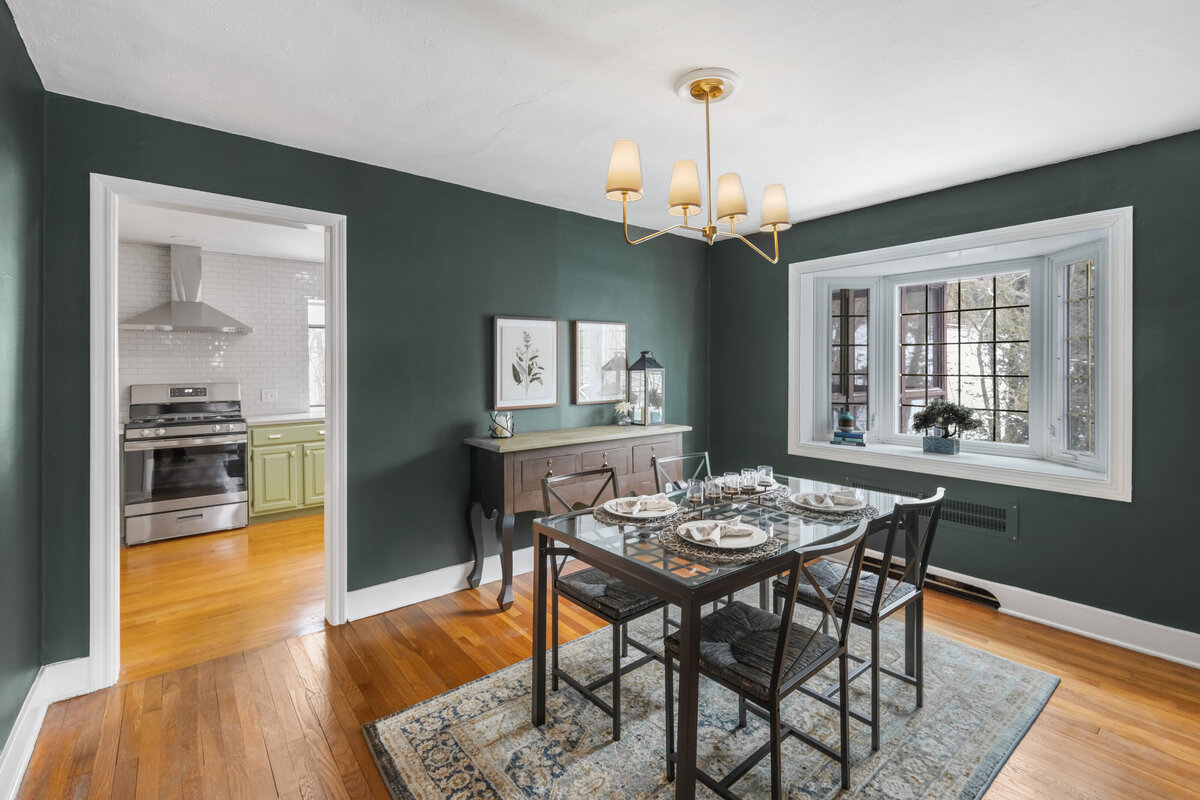 Modern dining room staging highlighting open-concept living and buyer-focused design