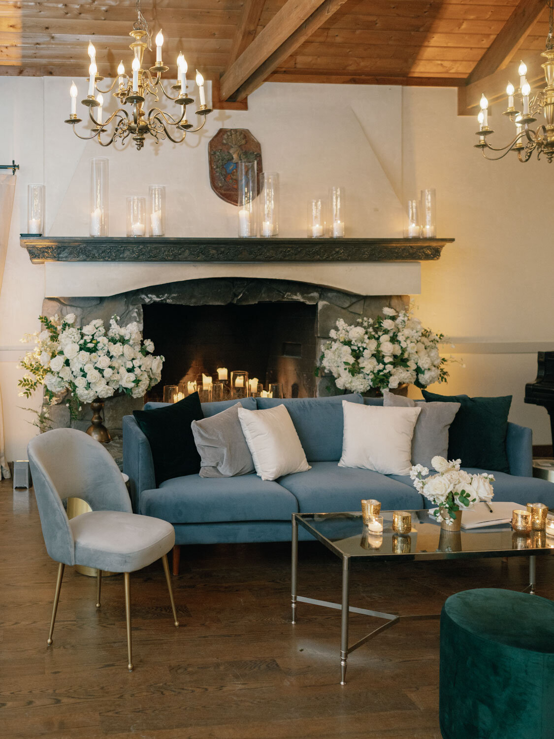 Cozy lounge area with a fireplace and floral accents