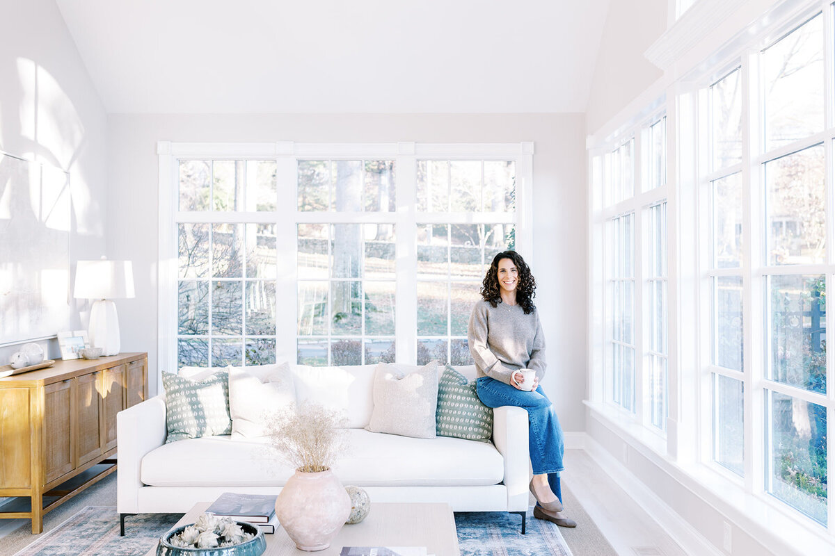 Jodi Berman on a couch in her office