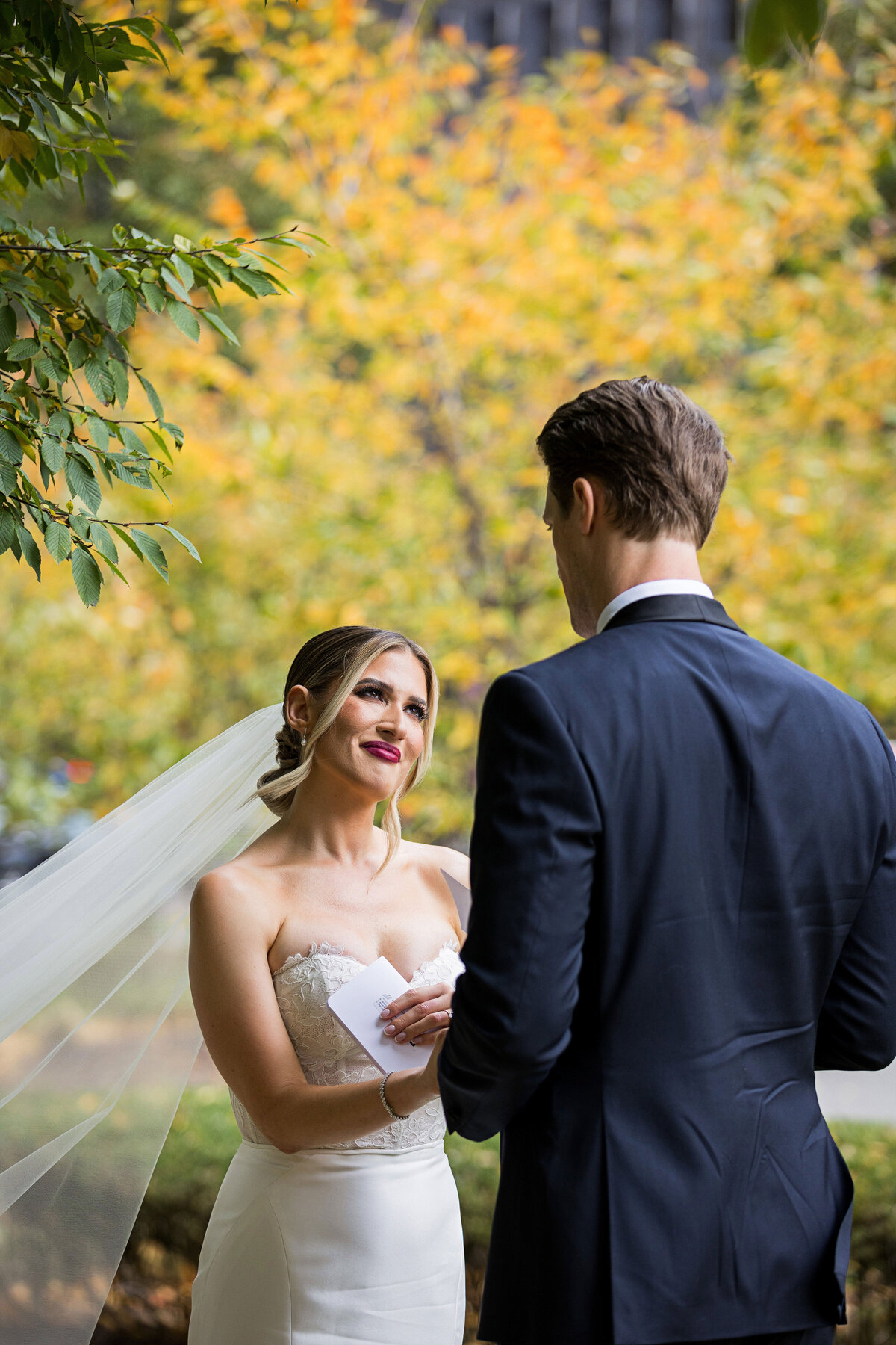 bride listening to wedding vows