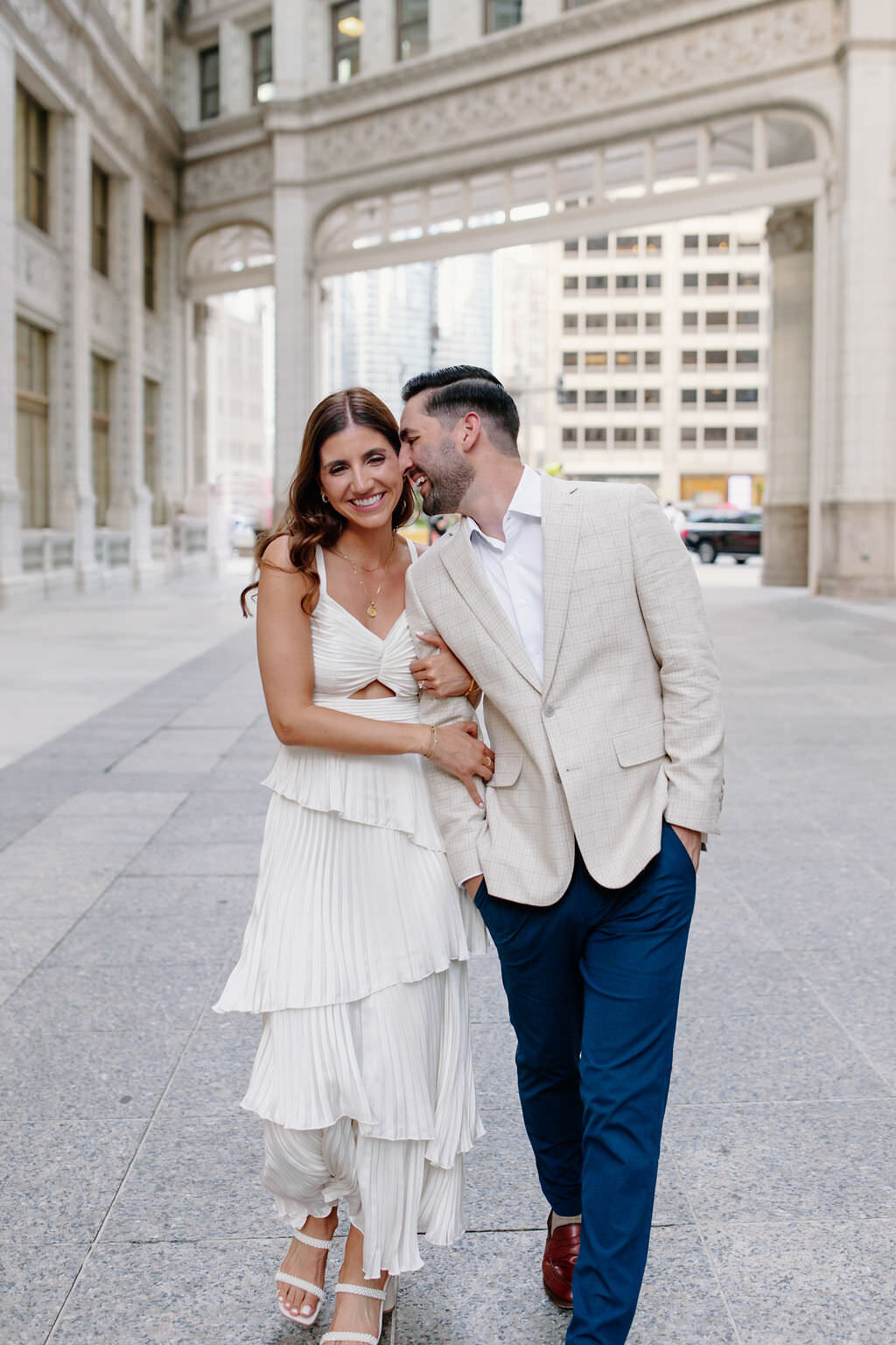An engagement photography session at The Wrigley Building and North Ave Beach in Chicago, Illinois - 22