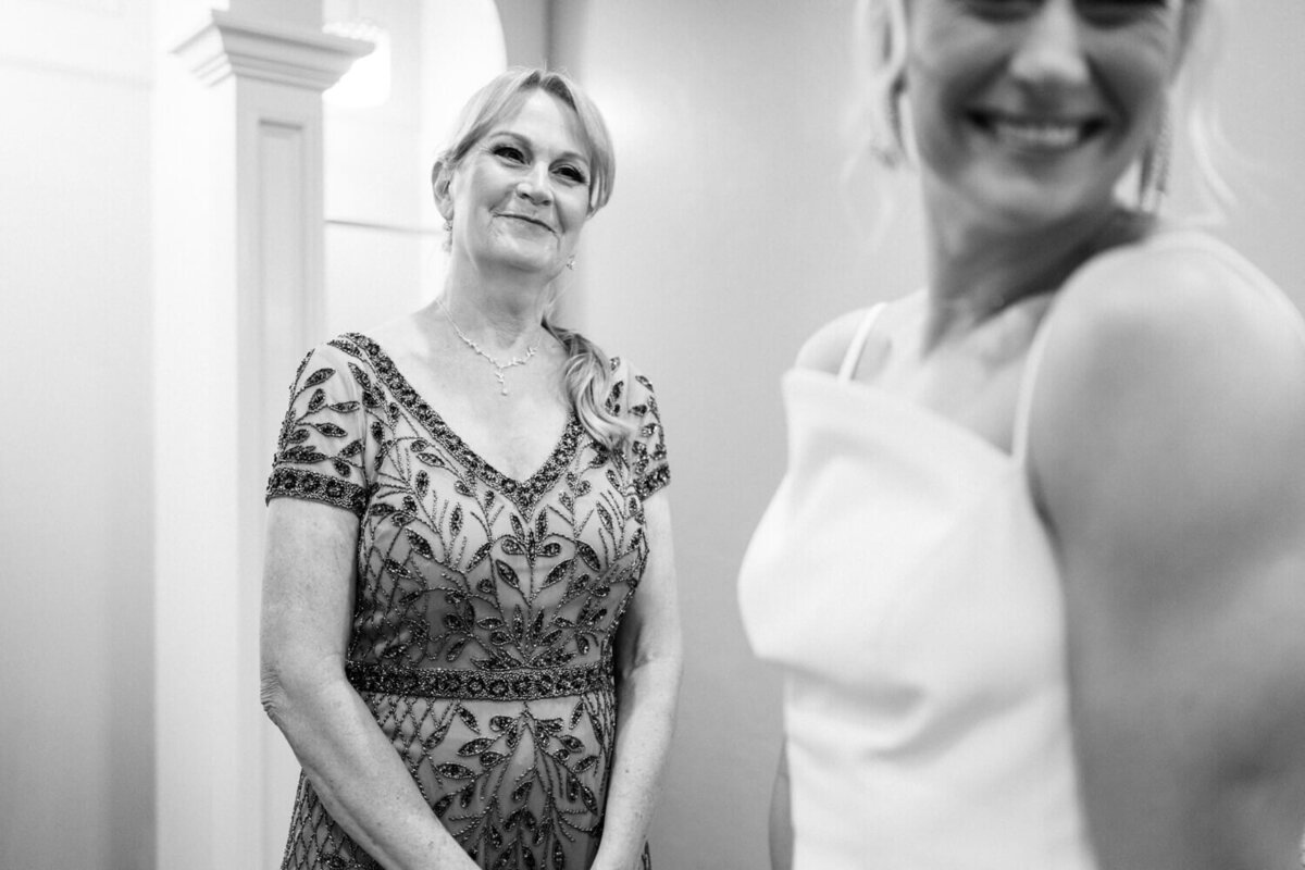 mom-smiling-at-bride