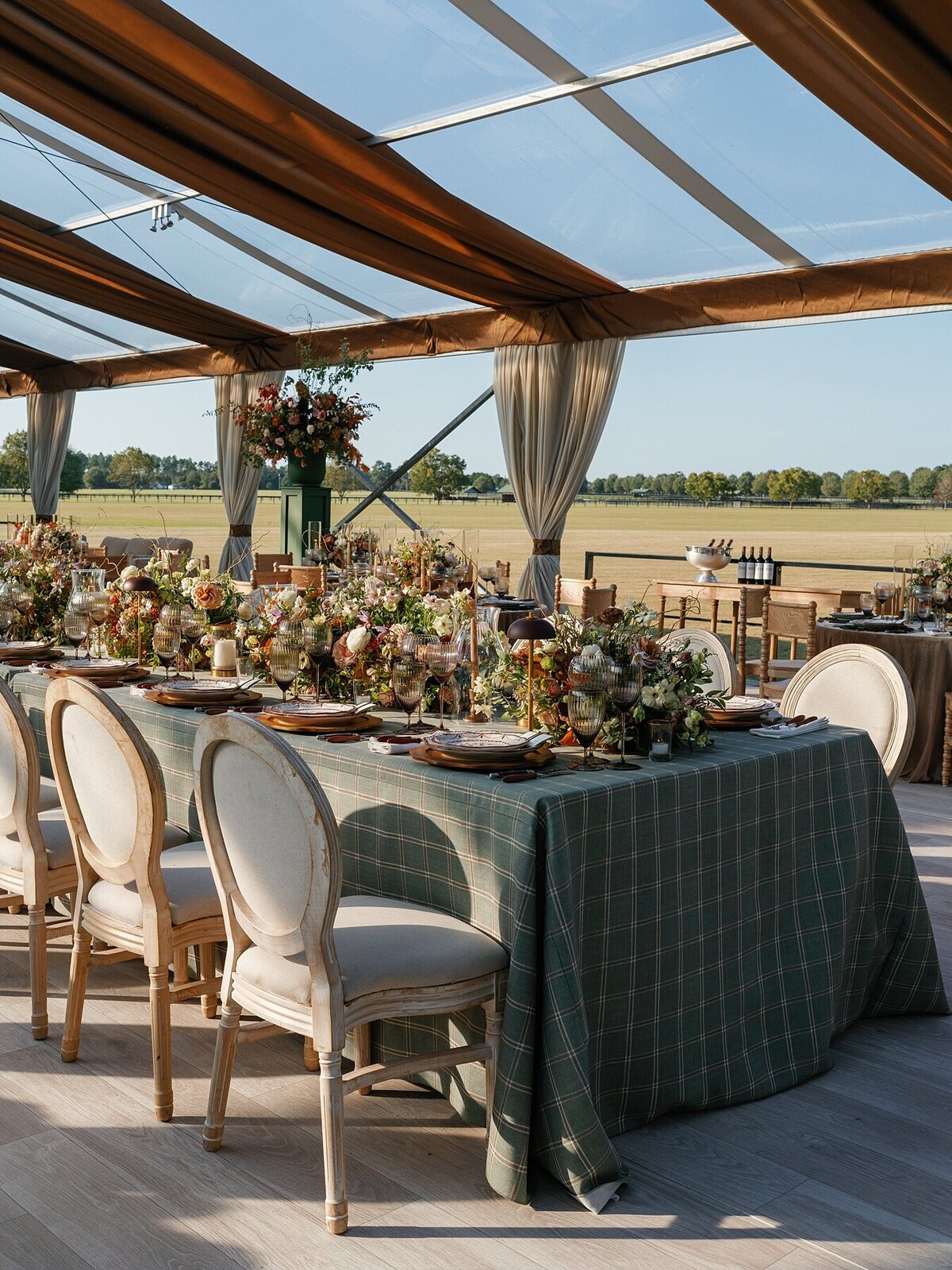Custom tented wedding celebration with fall Ralph Lauren vibes at private polo farm in Aiken, South Carolina by Sarah Bradshaw_0209