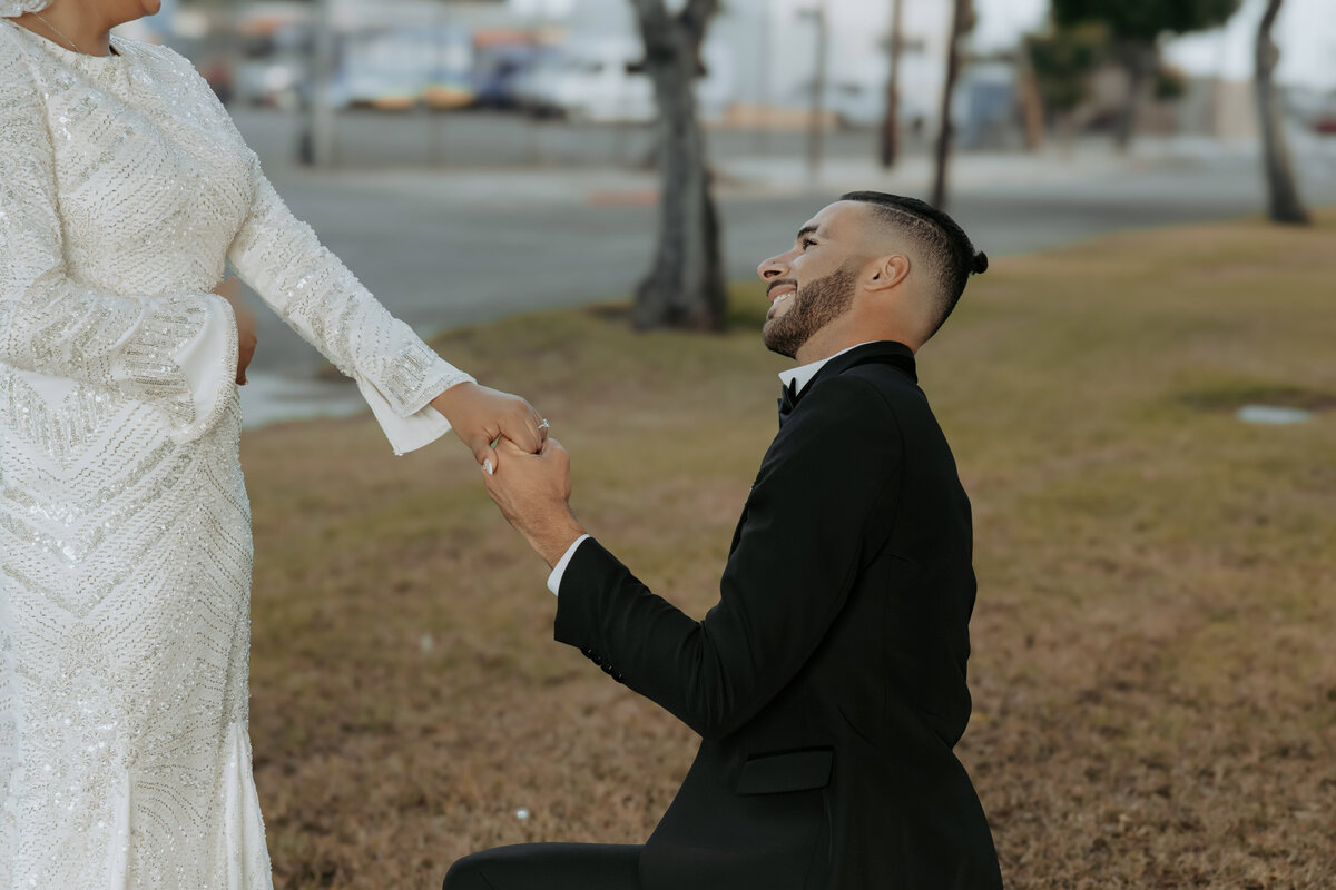 Arabian Wedding in LA – Groom Smiling Up at His Bride During Romantic Moment
