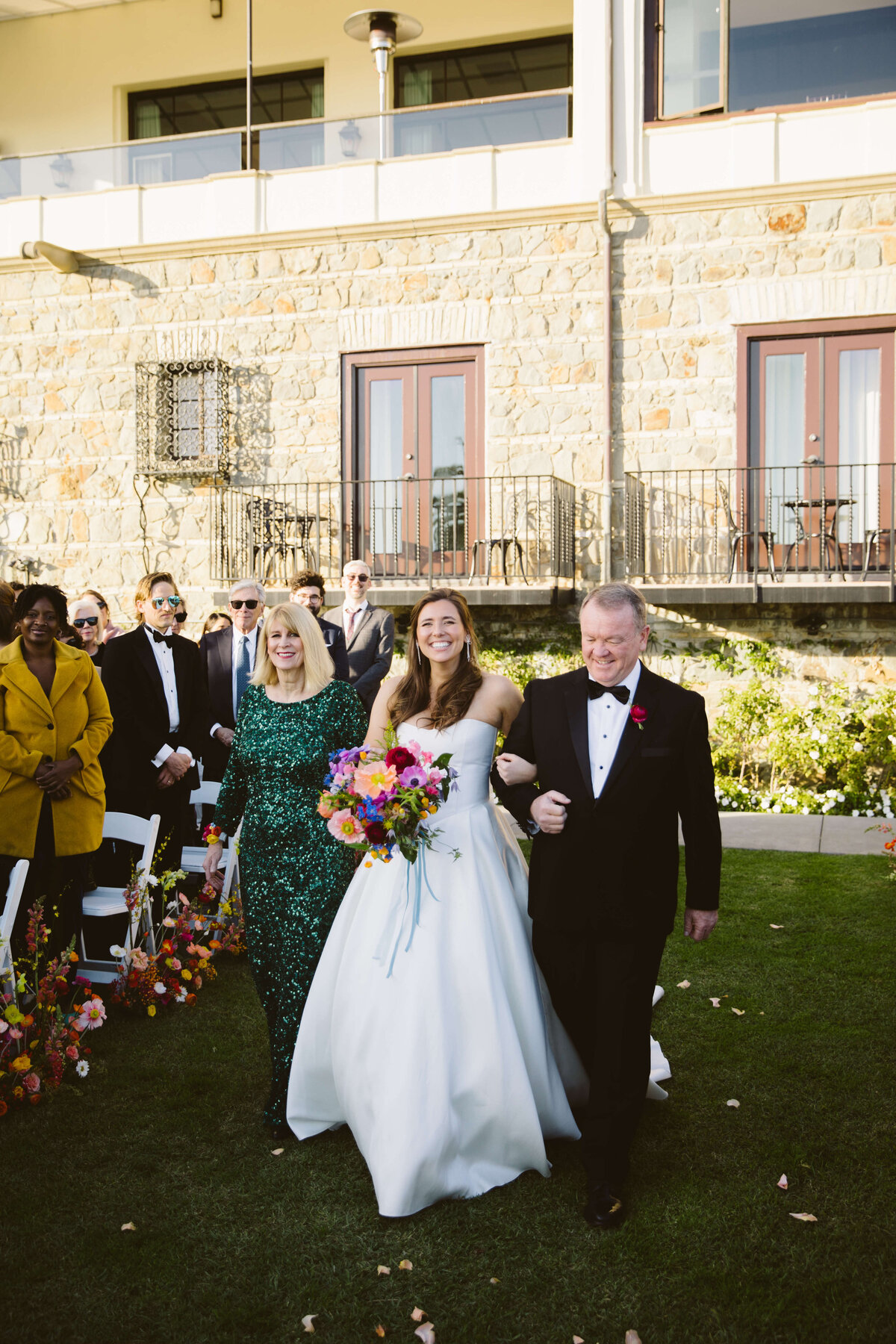 Bride walking down the aisle at Bel Air Bay Club