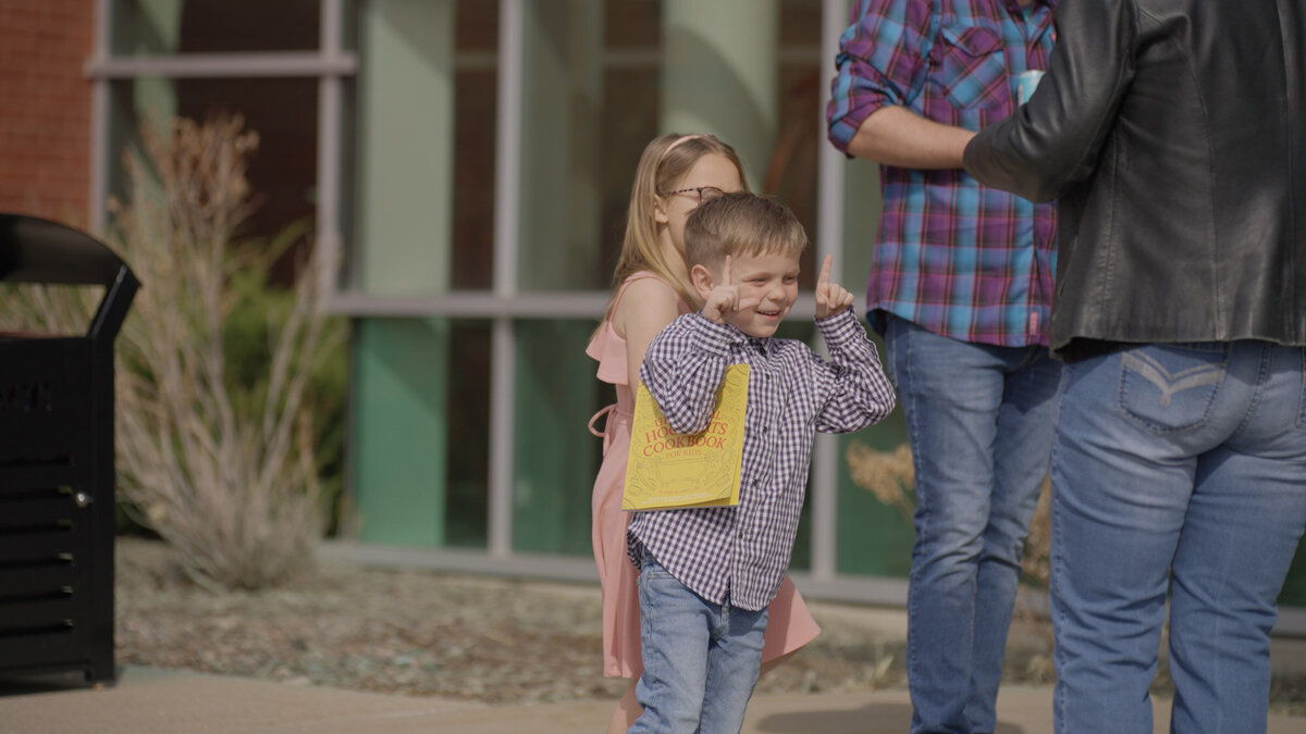 Child smiling outdoors