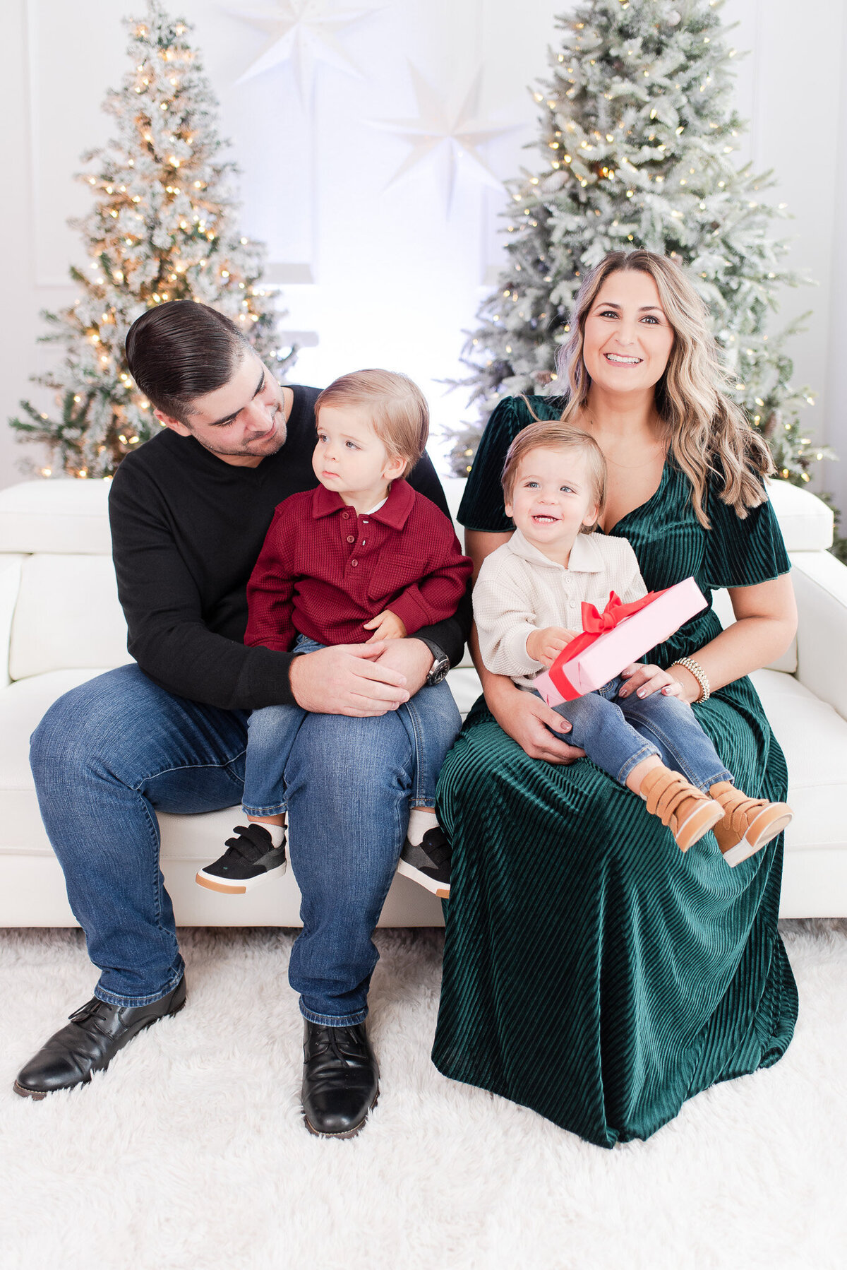 mom and dad with twins christmas photo