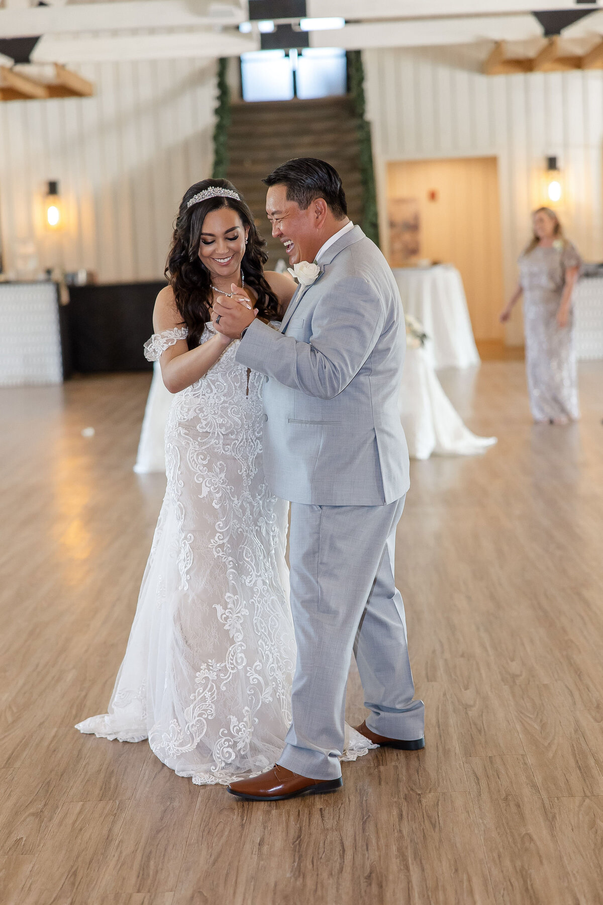 bride dances with stepfather at Milestone New Braunfels wedding