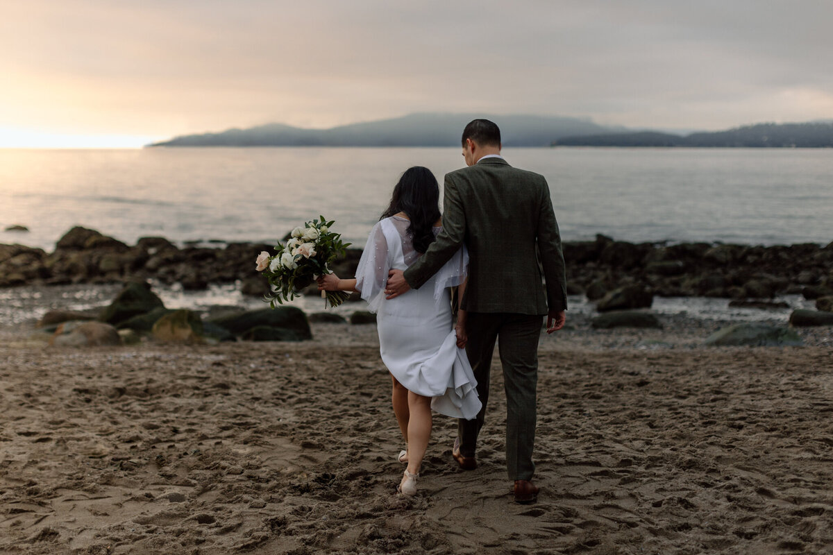 Stunning bride and groom on beach, capture by Bronte Taylor Photography, is a Vancouver based photographer with a playful, genuine and intimate approach.