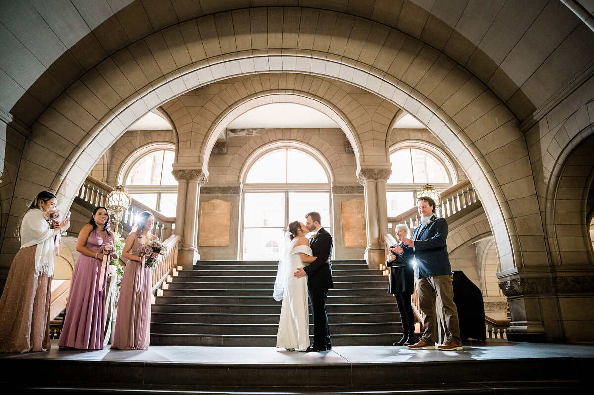 wedding photo on staircase at allegheny county courthouse pittsburgh