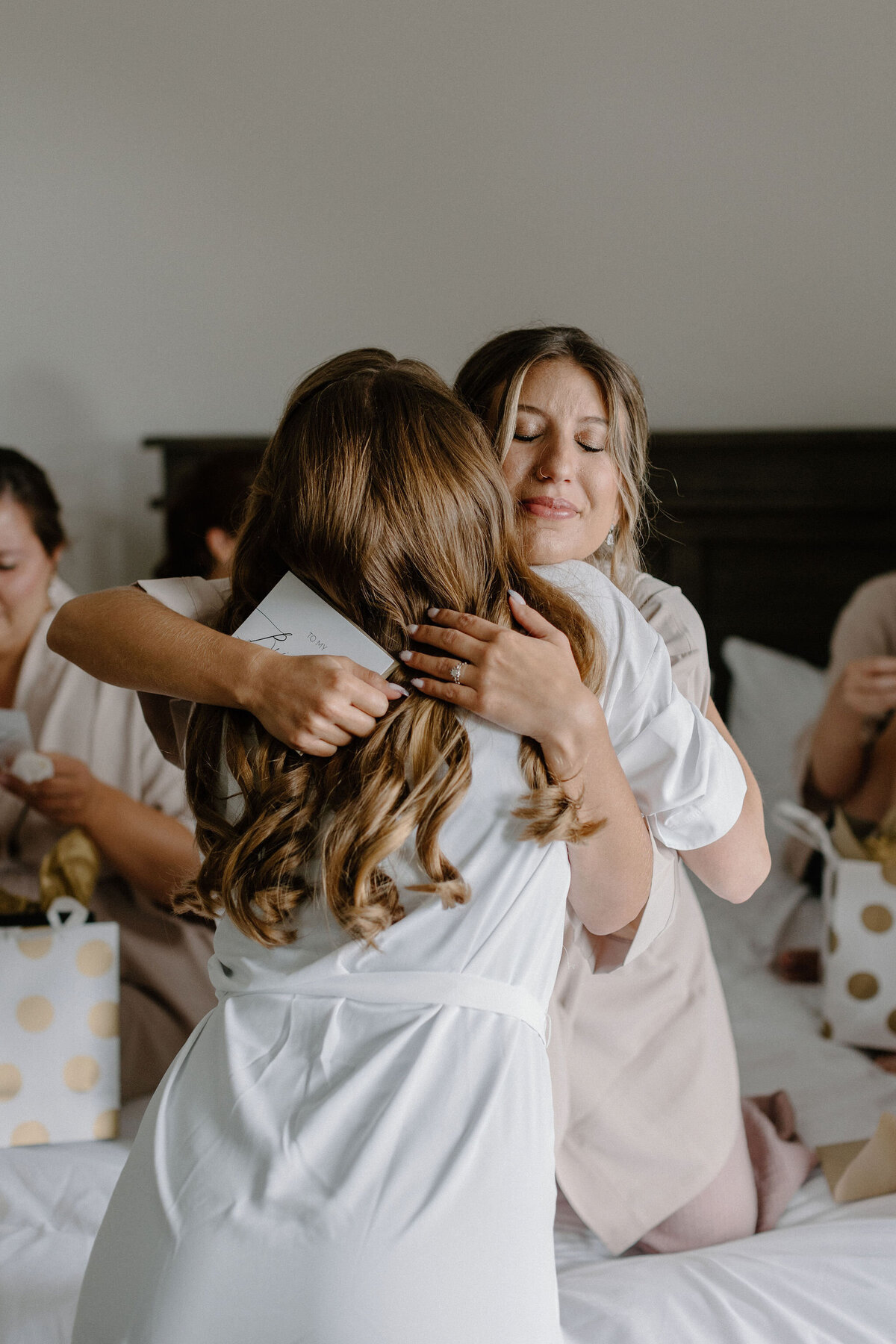bride hugging friend