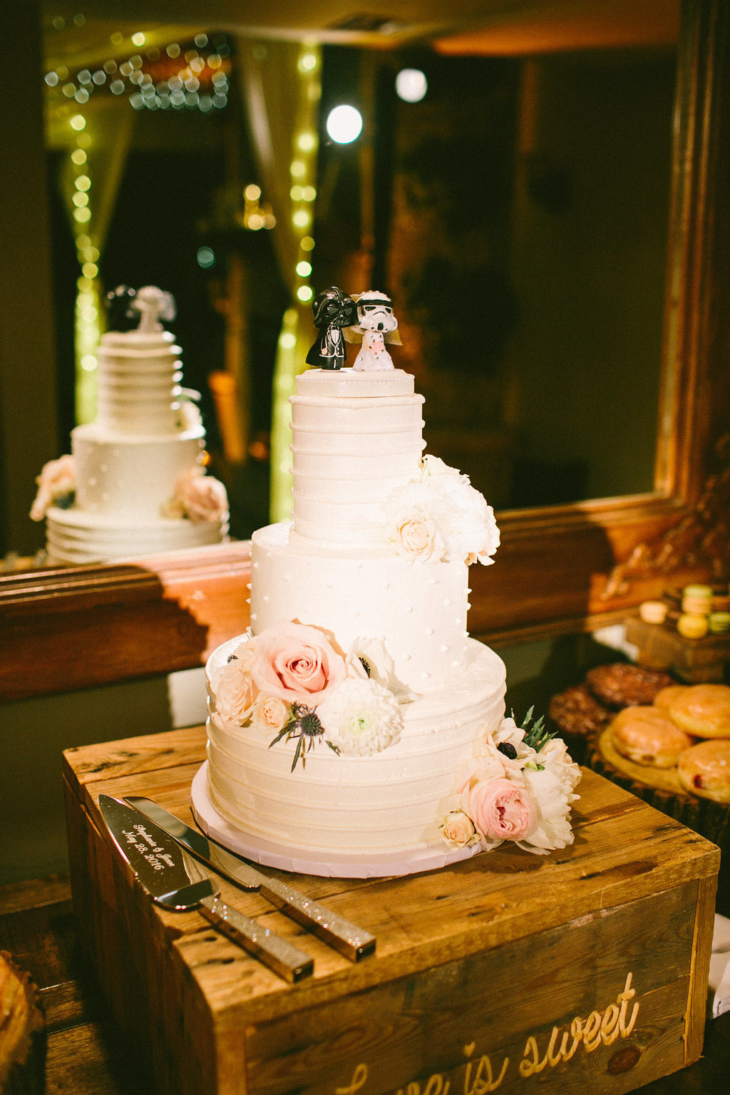 wedding cake on a rustic wood box