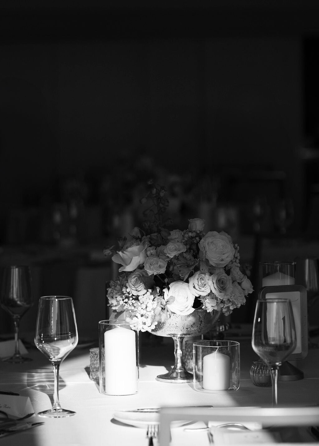 Romantic candlelit wedding reception table with floral centerpiece at Arizona Biltmore.