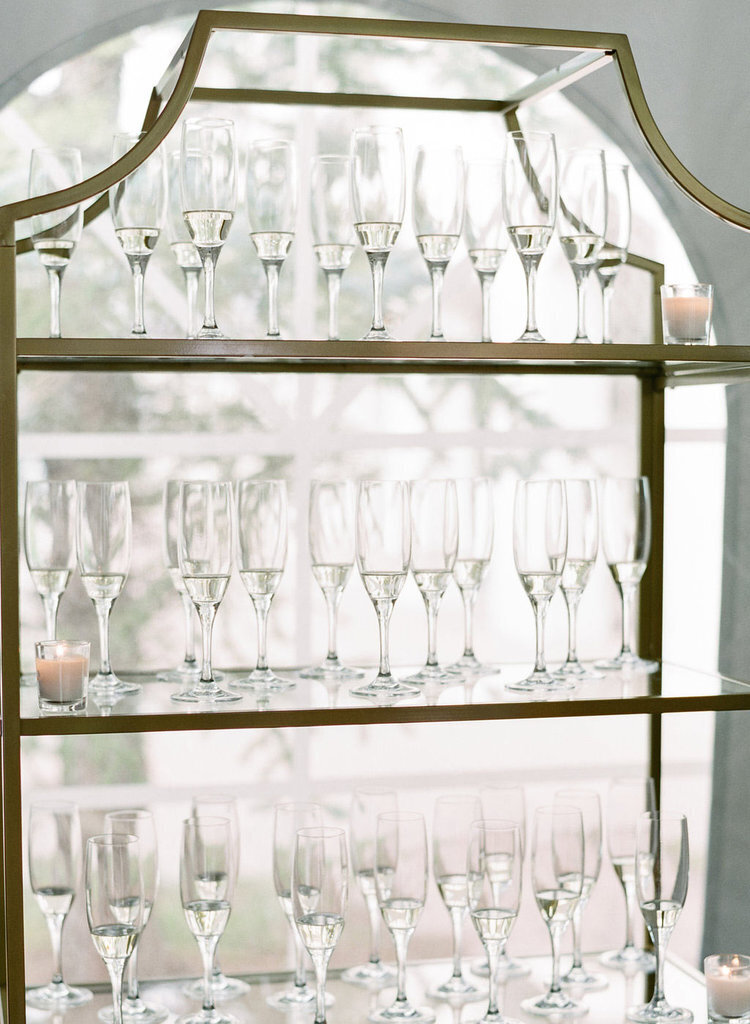 Champagne glasses at a bespoke wedding in Vail, Colorado