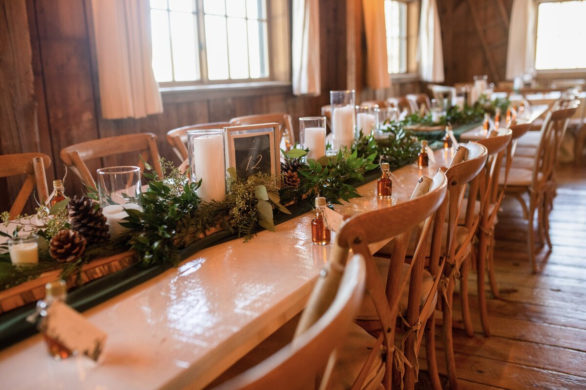 Wintry rustic farm tables in reception upstairs