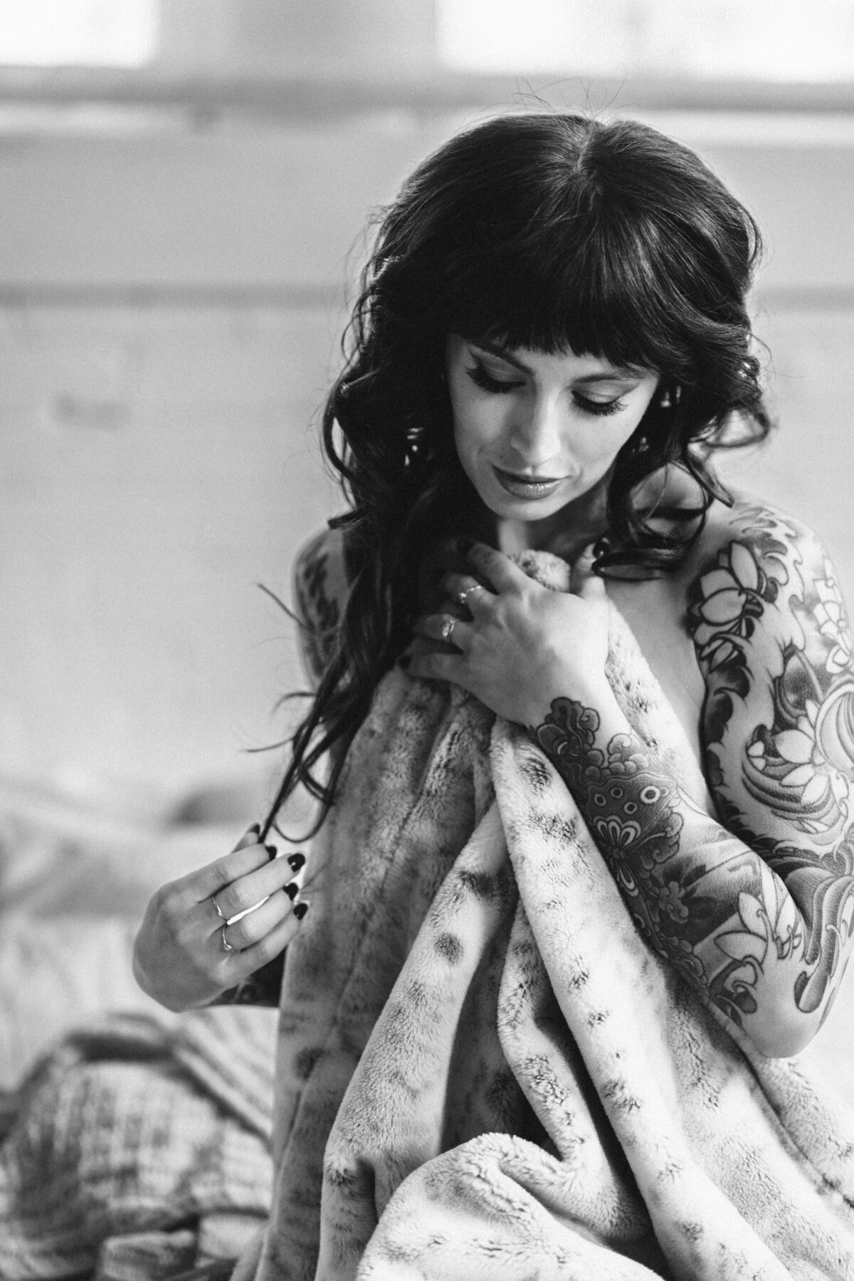 Artistic tattoo boudoir capturing unique body art and personal  style