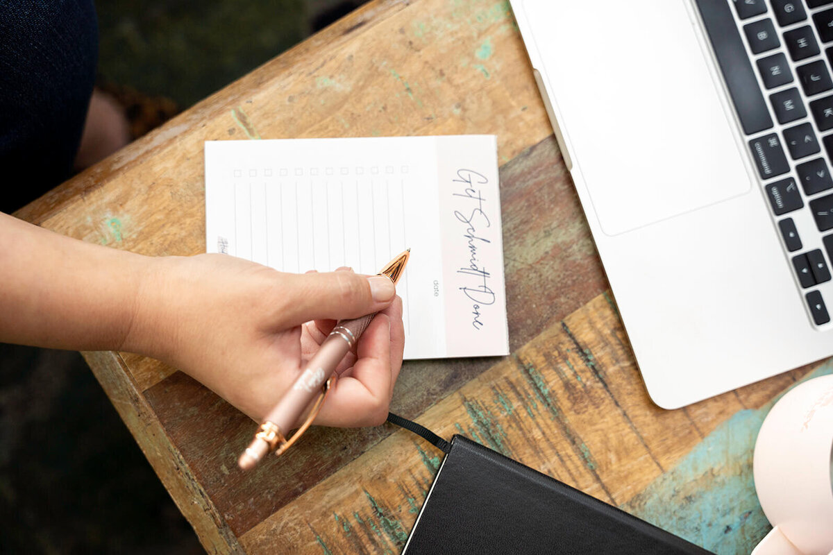 photo of a notebook and laptop for a personal branding photoshoot