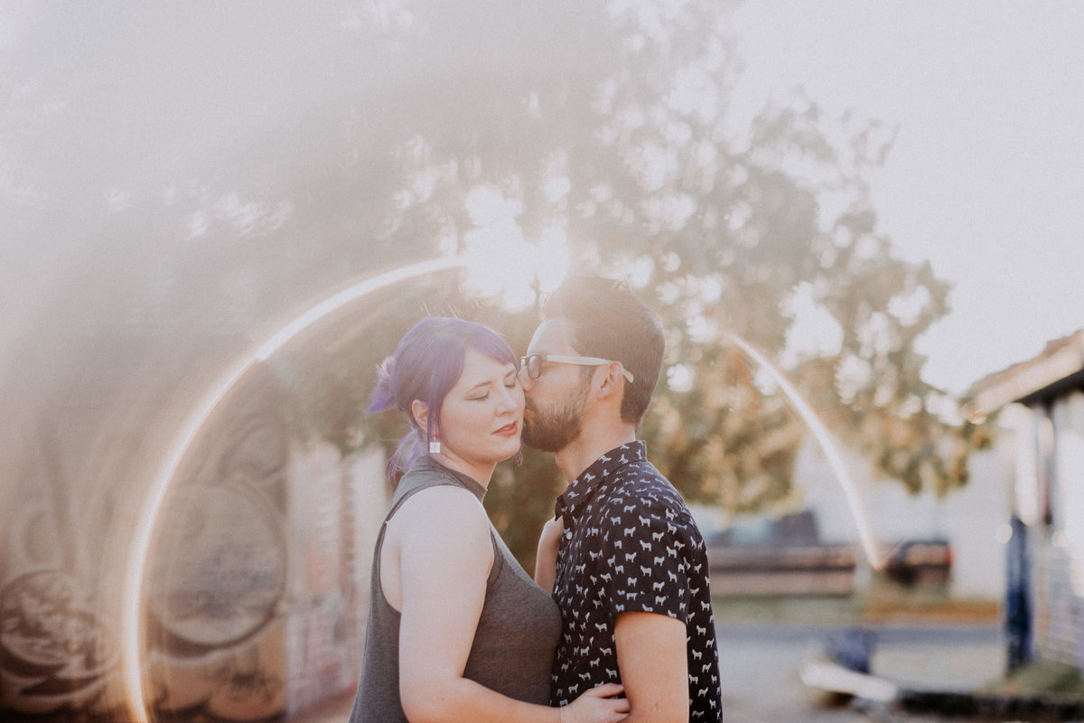 Lake Tahoe engagement photos groom kisses his bride