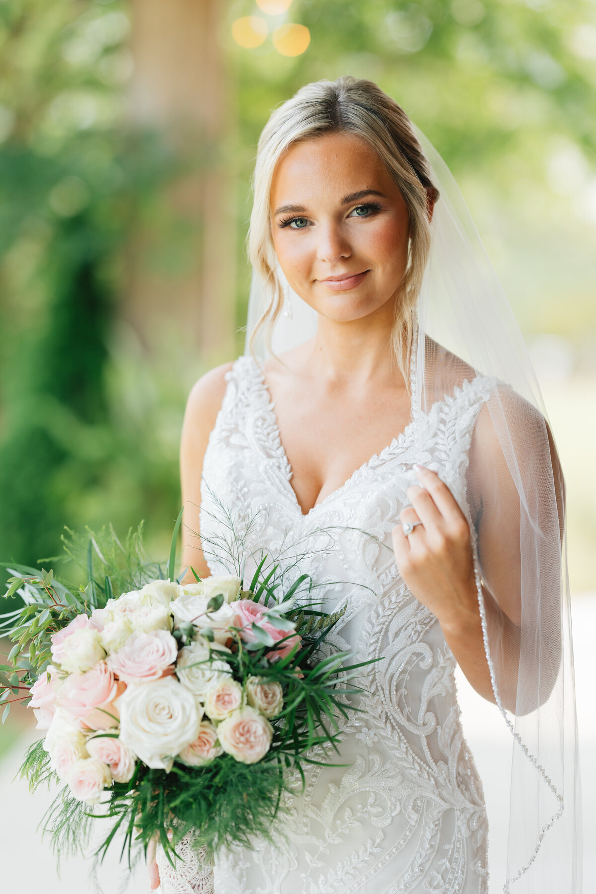 South Georgia bride smiling in her wedding dress and veil