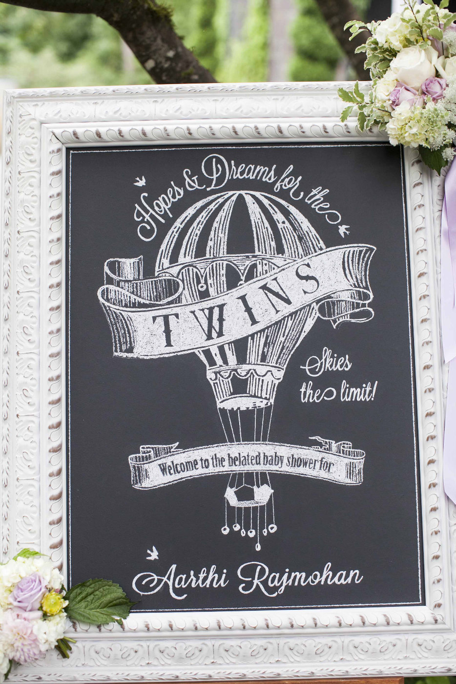 chalkboard signage with flower accents