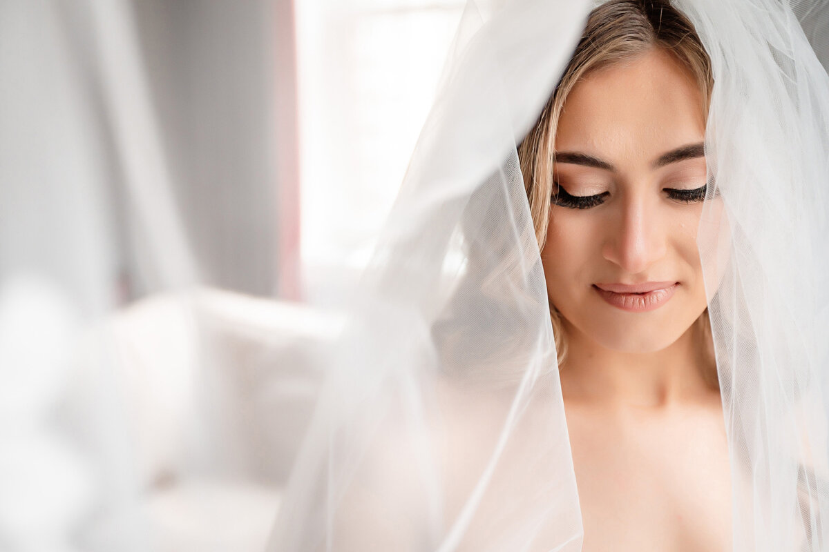 bride under veil at wedding duquesne club