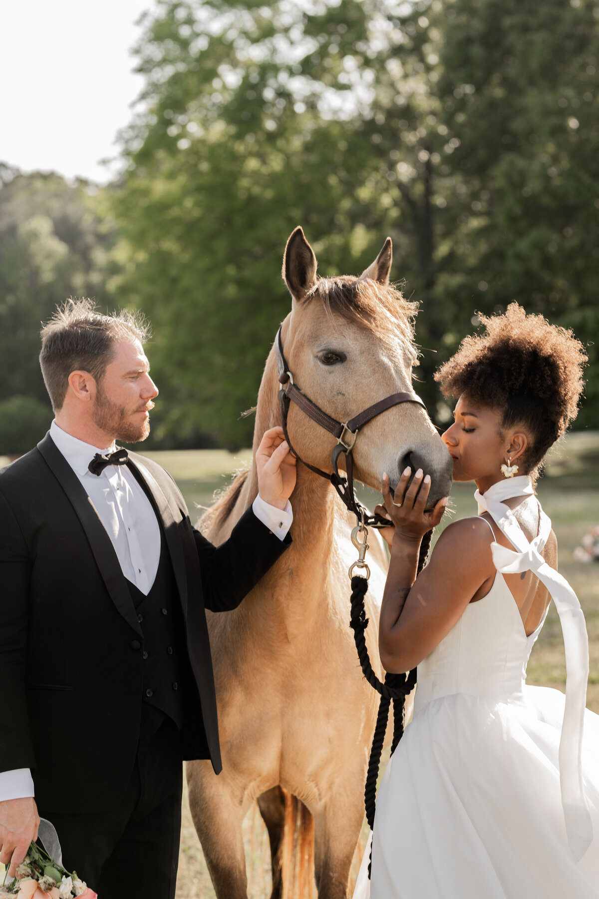 oxbow estate bride and groom with horse