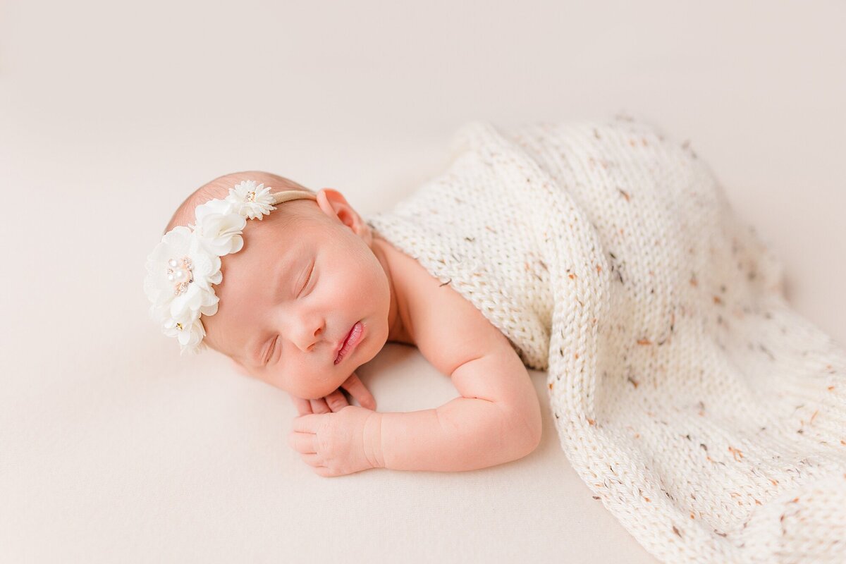 sleeping newborn on belly